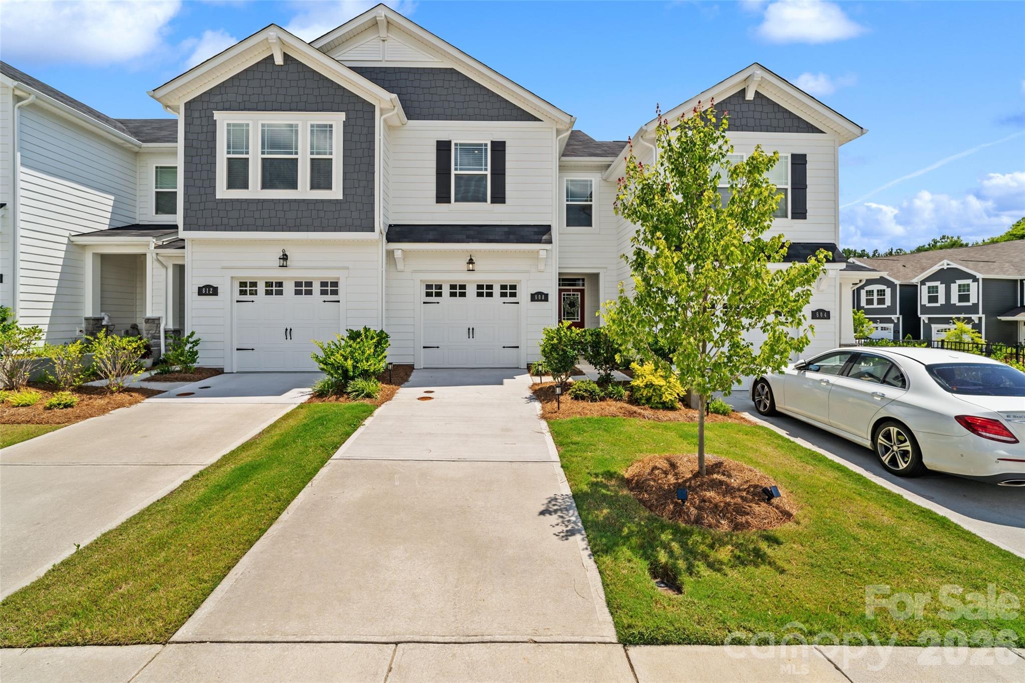 Why wait to build when you can move right into this beautifully maintained 2025 townhome with a premium lot opening to the green space in Arbor Chase? Filled with natural light and thoughtfully designed, this home offers a bright, open layout with stylish finishes and a fresh, modern feel throughout.

The spacious kitchen features a large center island, stainless steel appliances, generous pantry, quartz countertops and seamless flow into the dining and living areas - perfect for everything from quiet evenings at home to entertaining friends. Upstairs, the versatile loft provides flexible living space, while the primary suite offers a walk-in closet and an en-suite bath with a dual vanity and oversized tiled shower with bench. Two additional bedrooms, a full bath, and an upstairs laundry room provide comfort and convenience.

Enjoy your morning coffee or unwind at the end of the day on the coveted private rear patio that opens to the green space. The attached one-car garage, washer, dryer, and kitchen refrigerator are all included, making your move even easier.

Residents of Arbor Chase enjoy community amenities including professinal landscaping w/ irrigation, a pool, clubhouse, playground, dog park, sidewalks, and walking trails, waste/recycling collection, all conveniently located near shopping, dining, and everyday conveniences with easy access to the greater Clover and Lake Wylie areas. Zoned for award-winning Clover Schools. 1 year Home Warranty with APHW- America's Preferred Home Warranty with acceptable offer.