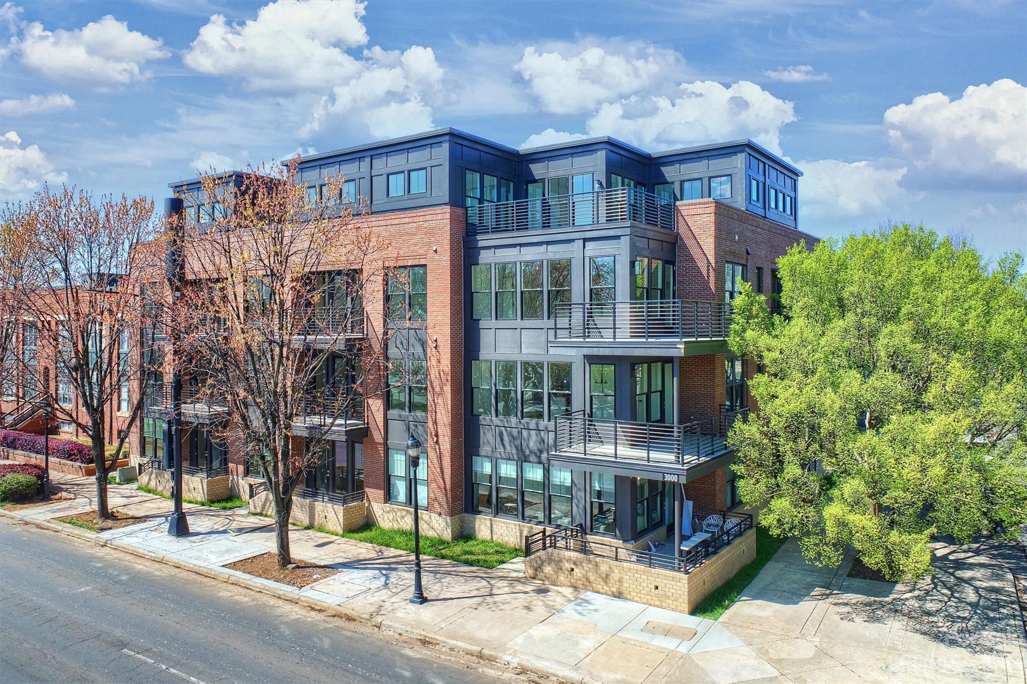 NOW SELLING! Welcome to The Jane Southend. This first floor unit features 2 bedrooms and 2 bathrooms with a balcony. This unit is a split living plan. Quartz countertops, hardwoods throughout and beautiful tile work.  Don't miss the opportunity to OWN in booming South End. New construction condominiums. 1 & 2 Bedroom options available. Located right in the heart of South End on the New Bern Station light rail stop.  The homes feature historic facades with contemporary details, large balconies and rooftop terraces. Modern interior touches with classic designs.