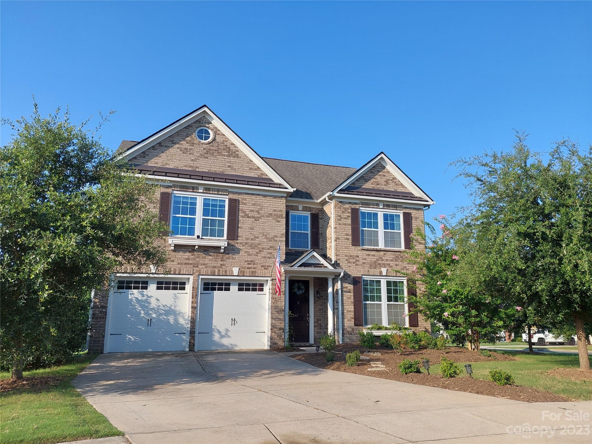 Don't miss this one in the desirable Lake Ridge neighborhood! This 4bed,2.5 bath home is locate in an excellent School district close to restaurants, grocery stores, shopping and highways. Office/Flex Room besides the Entry Foyer leading to an open floor plan with living room, dining area and a kitchen with a large island, SS appliances, gas range. Plenty of natural light. The screened door attached in the garage door can be used to transform it into a flex space. Upstairs Primary bed with walk-in closet, Primary bath with stand up shower and separate garden tub. As well as 3 beds and a full bath with dual sink. Laundry with folding area. The backyard was upgraded with a pergola and a custom paved area where you can enjoy the Carolinas' weather all year round in this corner lot. Lake Ridge offers clubhouse, fitness center (24/7), basketball and tennis court, playground, outdoor pool with waterslide, kids pool and walking trails. Come and fall in love with this well maintained house!