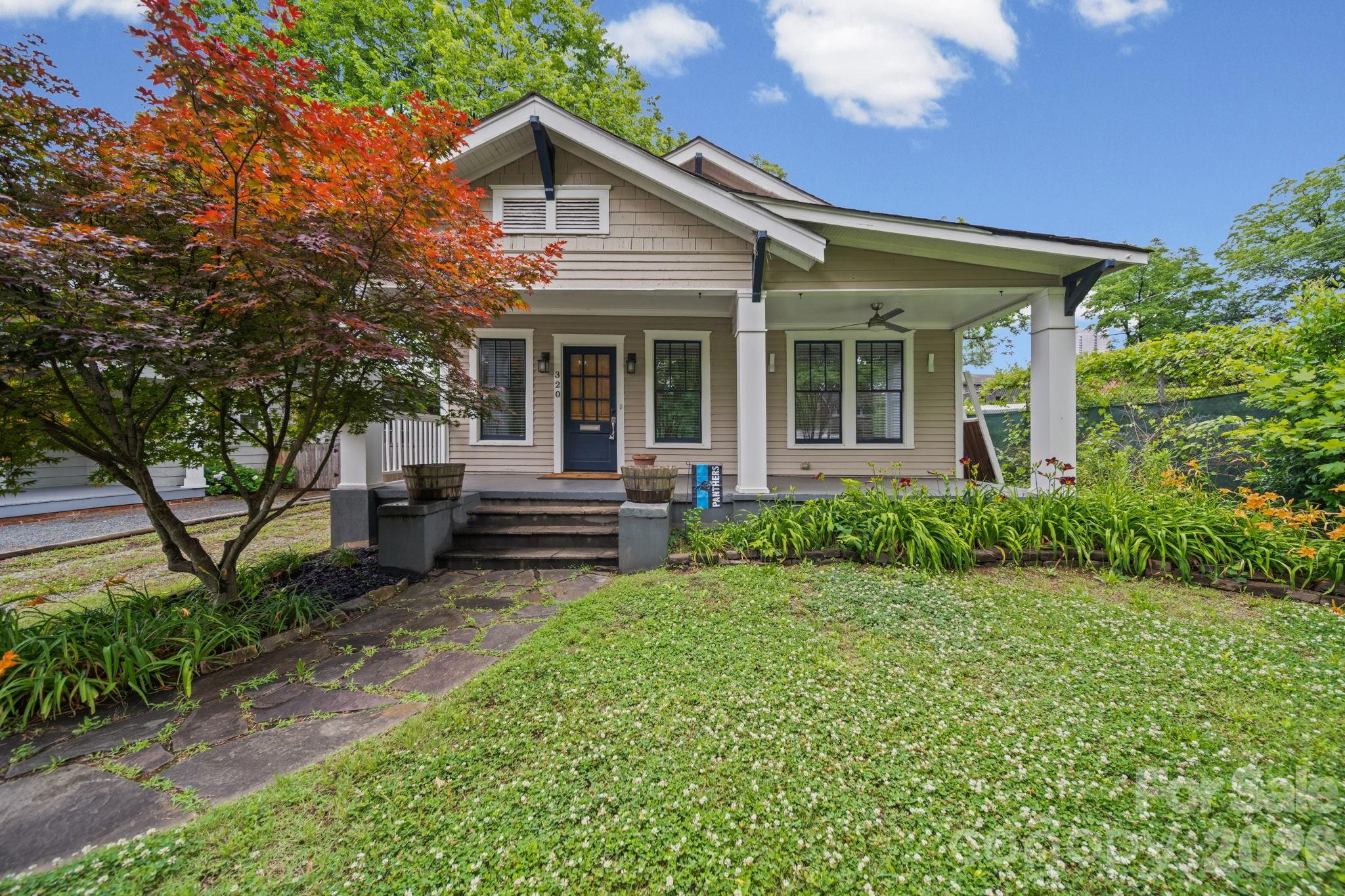 Charming bungalow in Historic Wilmore featuring a welcoming covered front porch and beautifully updated interior with new lighting throughout. Open dining area and kitchen with granite countertops, gas range, and ample storage. Two spacious bedrooms and two full bathrooms. New HVAC installed. Enjoy the beautiful back patio, fully fenced backyard, and storage shed. Conveniently located near Uptown, South End, restaurants, shopping, and nightlife.