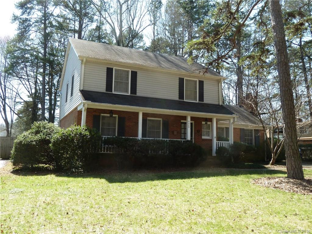4 Bedroom, 2 1/2 bath home convenient to downtown!  Masonry fireplace in cozy den, formal dining and living room, eat-in-kitchen, gleaming hardwood floors upstairs, carpet recently cleaned and updated full bathrooms.  Enjoy patio in park like setting with plenty of trees and privacy!  Wired storage building and quiet street.