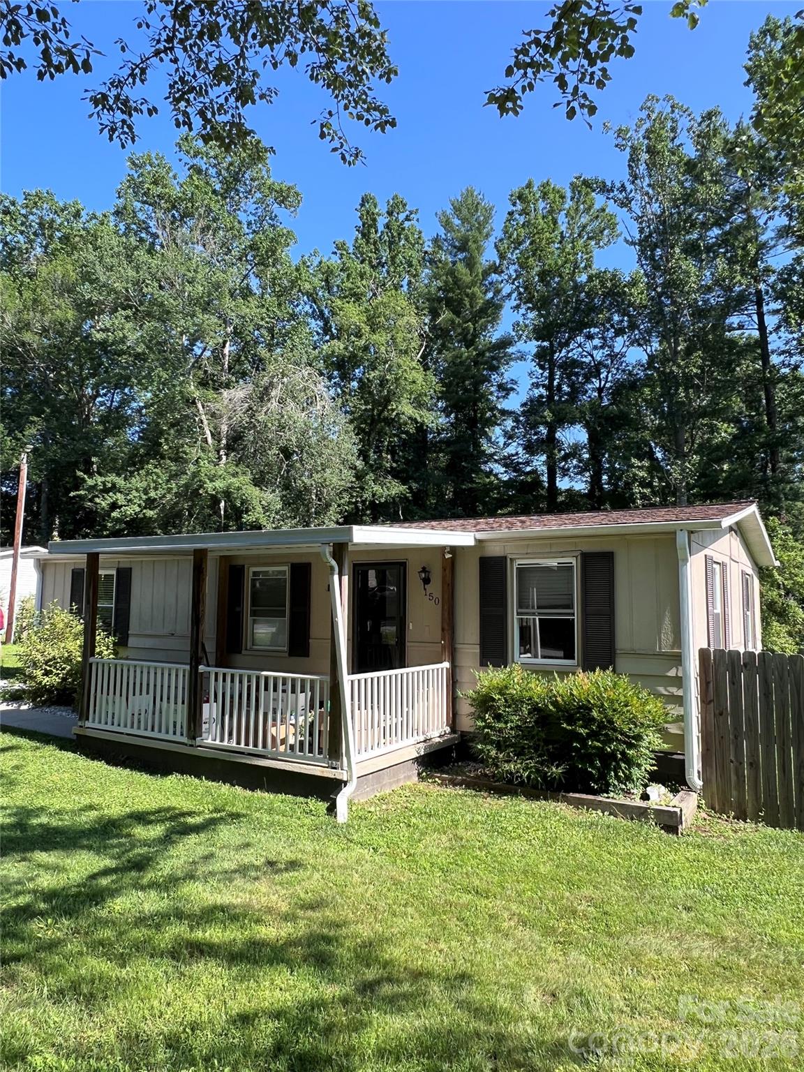 Three-bedroom, one bathroom manufactured home on a level lot with front porch and back deck. Outbuilding and fenced backyard. Home needs TLC. IMPORTANT: Home does not have a working septic system and a typical septic system CANNOT be constructed on this property. New owner must use another approved way to handle onsite sewage. Cash purchase. Property sold "as-is" in current condition. No repairs, warranties, or inspections provided by seller. All offers subject to lien holder(s) approval. Buyer proof of funds or pre-qual letter and Short Sale Addendum to contract is required.
