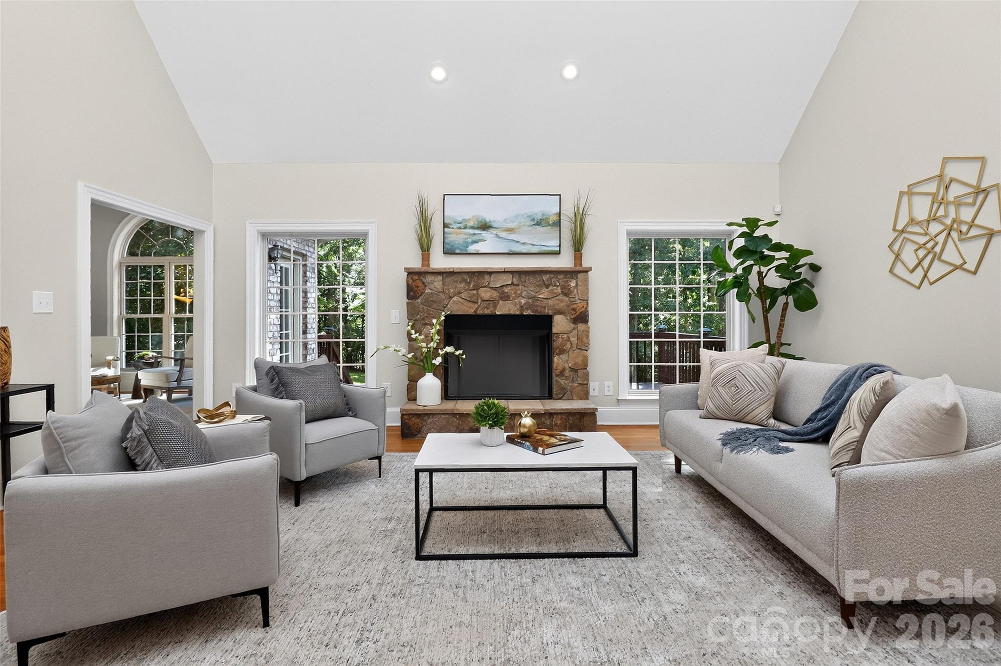 Set on more than an acre in Queen's Gate, this full brick home offers something that's becoming harder to find in Waxhaw—a custom home with space between neighbors, a private backyard, and a location less than five miles from downtown.

The kitchen sits at the center of the home and opens to two separate living areas, giving you multiple places to gather without everyone competing for the same space. The formal dining room, finished with a coffered ceiling and wainscoting, provides plenty of room for holiday dinners and larger gatherings. Recent kitchen updates include a new gas cooktop, dishwasher, and microwave.

The main level includes two bedrooms, each with access to a full bathroom, including the primary suite. The spacious primary bedroom features a tray ceiling, while the primary bathroom includes heated tile floors, a separate shower, and a soaking tub. The second main-level bedroom is currently used as an office but can easily serve as a guest room or flex space.

Upstairs, two additional bedrooms each have their own private bathroom. The nearly 400-square-foot bonus room provides plenty of space for movie nights, a game room, fitness equipment, hobbies, or a combination of uses.

Outside, the screened porch and newly painted deck overlook a private backyard that feels tucked away from the surrounding homes. It is a peaceful spot for morning coffee, dinner outside, or simply winding down at the end of the day.

Recent improvements include a well that was deepened to 400 feet and upgraded with a ½ HP pump. An eight-zone irrigation system helps maintain the lawn and landscaping.

With 3,463 square feet, four bedrooms, four full bathrooms, a three-car garage, and more than an acre of land, 4817 Pimlico Lane offers privacy, flexible spaces, and the features buyers are often looking for but rarely find together.