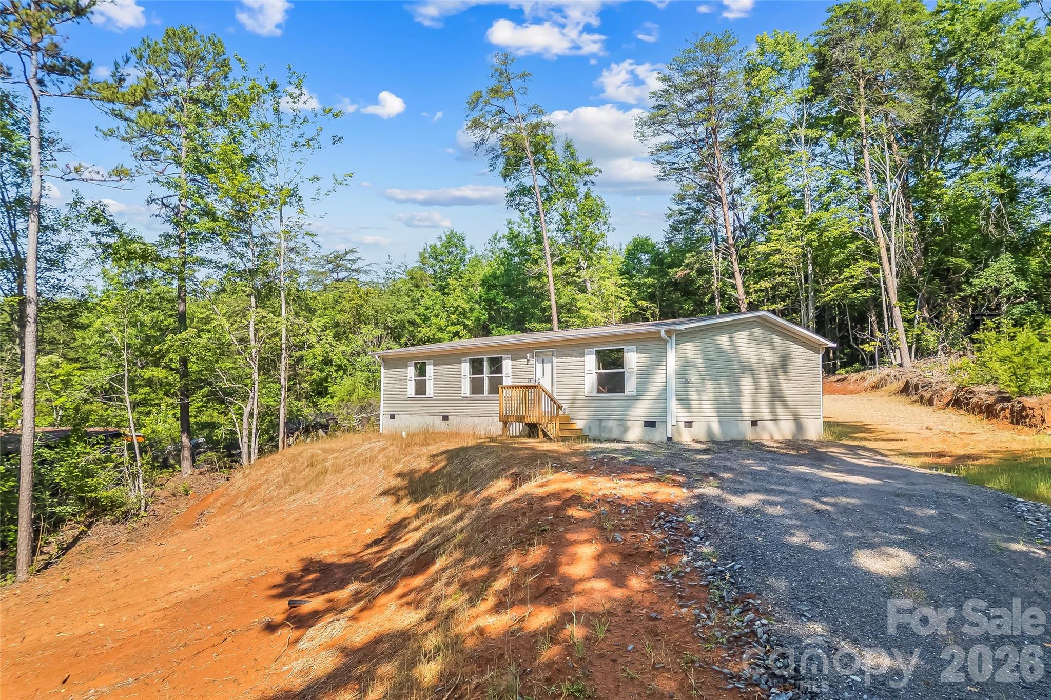 Brand-new 2026 manufactured home on approximately 0.49 acres in Marion! This move-in ready 3-bedroom, 2-bath home features an open floor plan, spacious kitchen, split-bedroom layout, and modern finishes throughout. Enjoy the peace of country living while being just minutes from downtown Marion, shopping, dining, and convenient access to I-40 for an easy commute to Morganton, Hickory, or Asheville. Don't miss this opportunity to own a never-occupied home without the wait of new construction!
