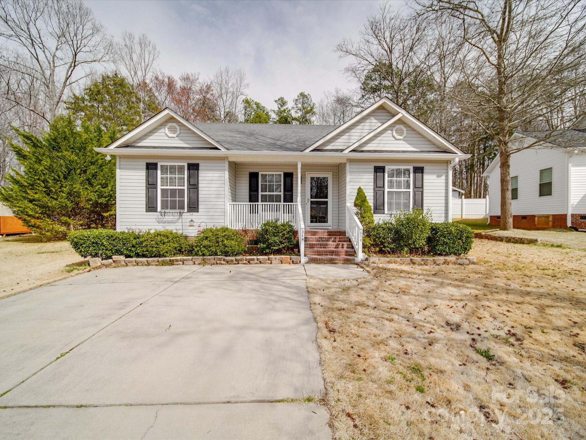 Welcome to this beautifully cared-for 3-bedroom, 2-bathroom home, offering a perfect blend of comfort, convenience, and charm. Nestled in a sought-after subdivision, this home features cozy front and back porches, perfect for relaxing mornings and peaceful evenings. Step into a bright and inviting interior, complemented by a spacious and rare flat backyard with no trees—a unique find in this neighborhood! Recent updates include a brand-new HVAC system and water heater (less than 1 year old). This home is ideally situated near Fort Mill’s popular dining spots, shopping centers, and beautiful outdoor spaces. It also offers easy access to Ballantyne’s entertainment district and recreational facilities, with a smooth commute to Charlotte and the airport. Experience the perfect balance of suburban tranquility and city convenience in this exceptional property. Don’t miss out on this rare gem—schedule your showing today!