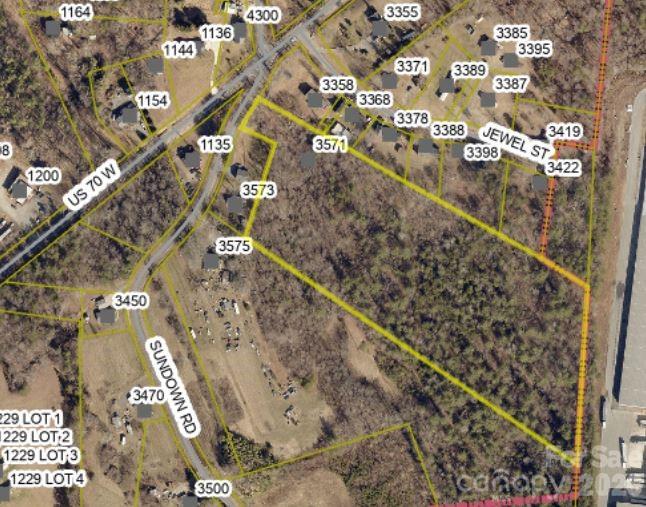 Builders dream  9.86 acres  located in Glen Alpine a nice track of land that will allow a large home site. Seller has has a complete set of plans for a 12 lot subdivision already been approved by the Glen Alpine zoning. Property has been perked for 12 lots  3 bedroom  DOT Aproval for drive.  Call listing agent for details