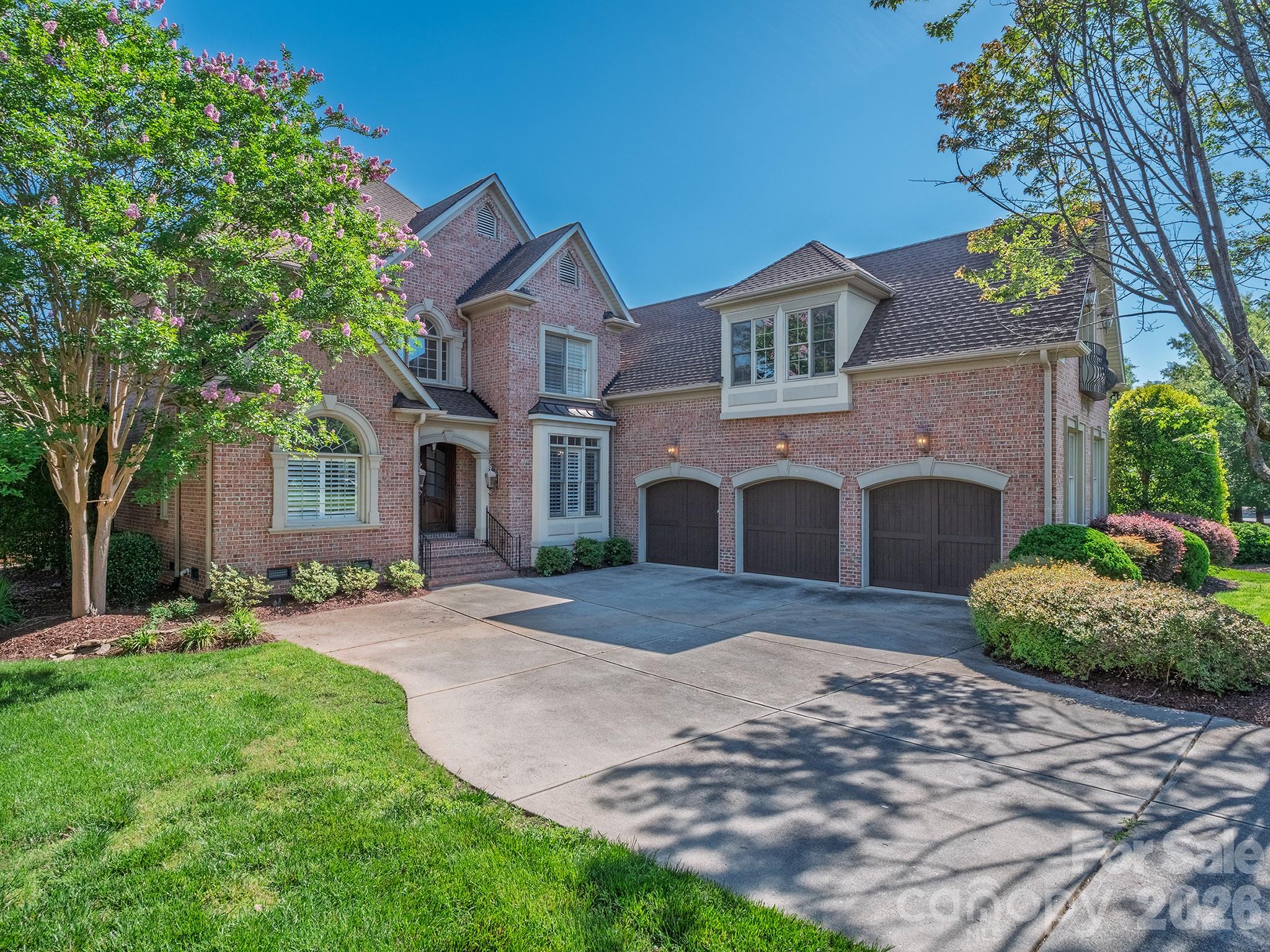 Designed for the way families live today, and PRICED TO SELL this exceptional custom home in gated Therrell Farms offers rare flexibility for multigenerational living while maintaining luxury, privacy, and style.  Major updates already completed with a new 50-year roof (2022) and new HVAC systems (2020), crawl Space Vapor Barrier Installed (2020) and a new pool pump in 2026, providing peace of mind for years to come.

With primary suites on both the main level and upper level, plus two oversized bonus rooms, this home easily accommodates extended family, guests, teens, or private work from home needs. Every space feels intentional, spacious, and adaptable as life evolves.

The main level features a light-filled, open floor plan with hardwood floors, formal living and dining rooms, and a welcoming family room anchored by a gas fireplace. At the heart of the home, the chef’s kitchen is designed for gathering and includes a gas cooktop, double wall ovens, abundant prep space, and generous seating for everyday meals or larger celebrations.

The main level primary suite offers true ease of living with a spa-inspired bath, dual vanities, a soaking tub, and a walk-in closet, making it ideal for long-term comfort or in-law living. Upstairs, a second private suite, additional bedrooms, and flexible bonus spaces create separation and independence while still feeling connected.

Step outside to a private, resort-style backyard that elevates everyday life. Enjoy a heated saltwater pool, pool house with wet bar, full bath, and laundry, plus a covered lanai with outdoor kitchen and fire pit, perfect for hosting family gatherings, milestone celebrations, or quiet evenings at home. A peaceful zen garden completes the retreat.

Additional highlights include a three-car garage, top-rated Marvin schools, Union County taxes.

This is a home built not just for today, but for every season of family life, where generations can live comfortably together while still enjoying space, privacy, and refined living.