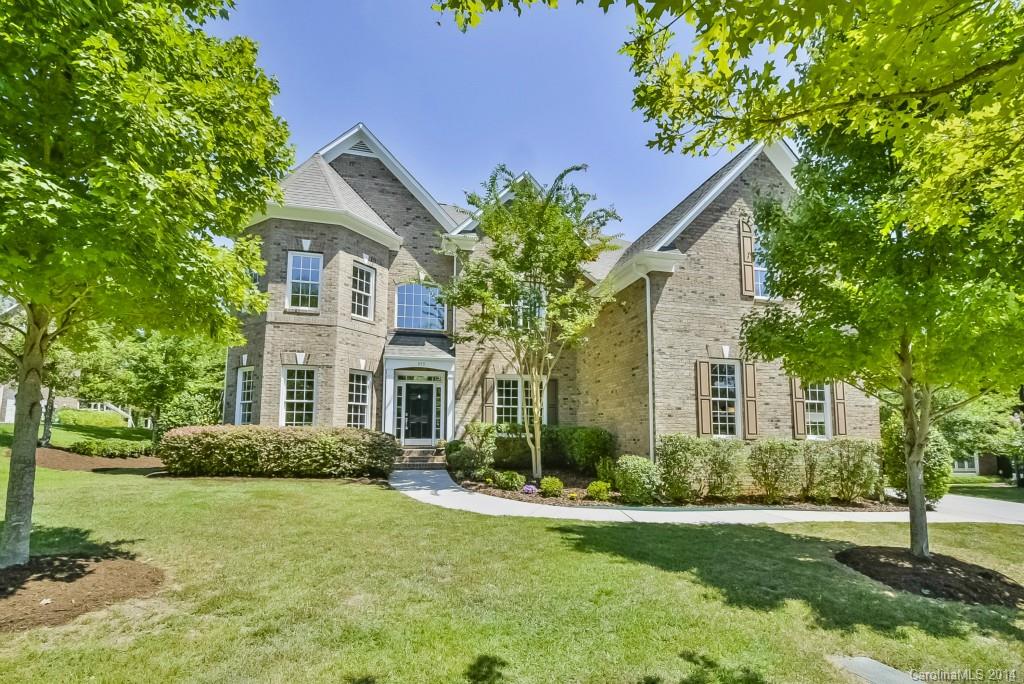 Lake Wylie masterpiece! Magnificent pool ready, waterfront site on .80 of an acre. Grand, full brick home w/all the bells & whistles. Stunning window wall in great room brings waterfront views & light into the open living design. Gourmet island kitchen w/stainless appliances & granite countertops, formal areas & office on main, master suite w/sumptuous bath & huge custom closet, bonus/media or 5th bedroom on 3rd level w/private bath, gleaming hardwood floors on main & in master, boat dock w/lift