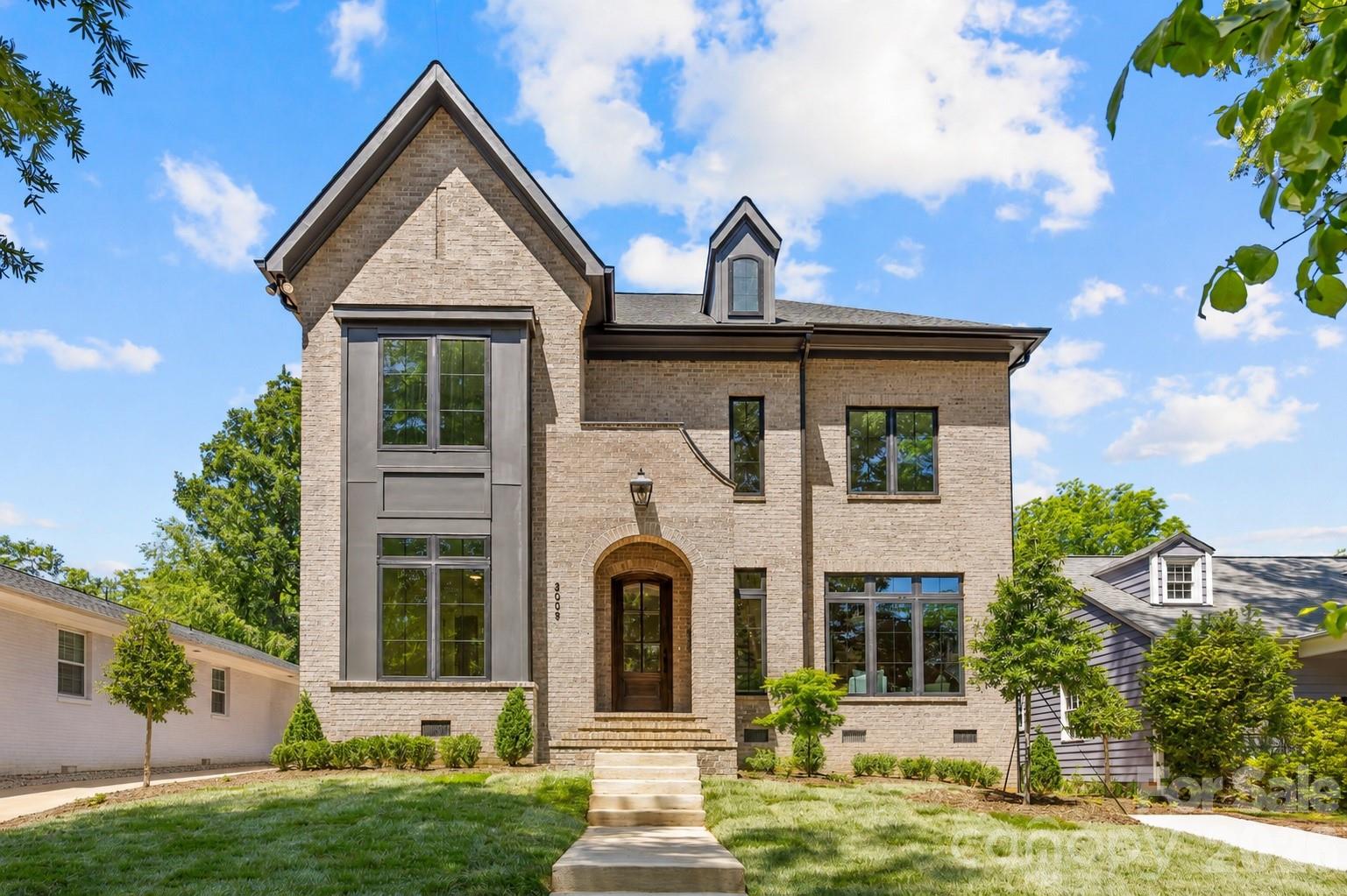 Thoughtfully designed by architect Robert Foster and built by Westwood Custom Homes, this stunning new construction delivers modern, accessible luxury in the heart of Plaza Midwood. This two-story home pairs elevated design with effortless livability, just moments from neighborhood favorites like Supperland, Uchi, Culture Shop Mezzo Market, and an easy stroll—or roll—to Midwood Park, where the neighborhood comes alive.
A dramatic two-story foyer sets the tone, opening to a light-filled main living space with soaring 10-foot ceilings. A stunning fireplace surround grounds the living room, while seamless access to the covered porch creates effortless indoor/outdoor flow for entertaining. The chef’s kitchen is the heart of the home—both striking and highly functional—anchored by an oversized island and exceptional tile selections. The moody scullery features statement backsplash, copious storage and a second dishwasher that's crafted for seamless entertaining.
The main level offers a private guest suite and dedicated office, creating exceptional flexibility for visitors, multigenerational living, or work-from-home ease. Upstairs, the primary suite serves as a refined retreat, complete with a spa-inspired ensuite featuring a soaking tub, glass-enclosed shower, and dual vanities. Spacious secondary bedrooms and a generous flex space provide endless versatility for a media room, playroom, or additional guest accommodations.
Refined yet welcoming, sophisticated yet deeply livable—this is luxury thoughtfully designed for the way you live today. Join our open house this Saturday 11-1 for your own private tour then head over to Midwood Maynia held in Midwood Park and see what Midwood is all about.