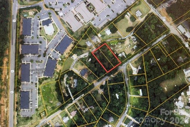 Discover the potential of these two combined lots, totaling approximately 9/10 of an acre, in a highly convenient location just off Highway 21, with valuable road frontage on both Forest Drive and Ed Thompson Road in Fort Mill, SC. This unique property includes two mobile homes—a 1979 model measuring 65x12 and a 1990 model measuring 65x28—offering opportunities for rental income, extended-family living, or future improvements.

The property’s location is hard to beat, with easy access to shopping, dining, and everyday conveniences, plus nearby award-winning schools. Commuters will appreciate being only 30 minutes from Charlotte Douglas International Airport, making travel to Charlotte and surrounding areas quick and convenient.

Whether you are looking for an investment opportunity, a place to call home, or a property with added flexibility, this combined parcel offers excellent dual road frontage, convenience, and plenty of potential in a desirable Fort Mill location.