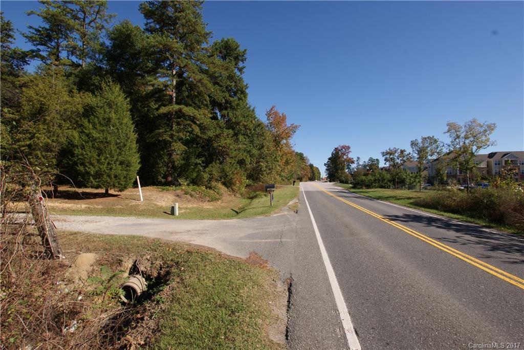 Total of 4.5 acres sits approximately 1300 feet from the corner of Pleasant Rd & Gold Hill - Zoning is currently RD-I,  300+ feet of road frontage on Pleasant Rd. Home and out buildings on property conveys at no value.  A septic and well currently service the existing home.