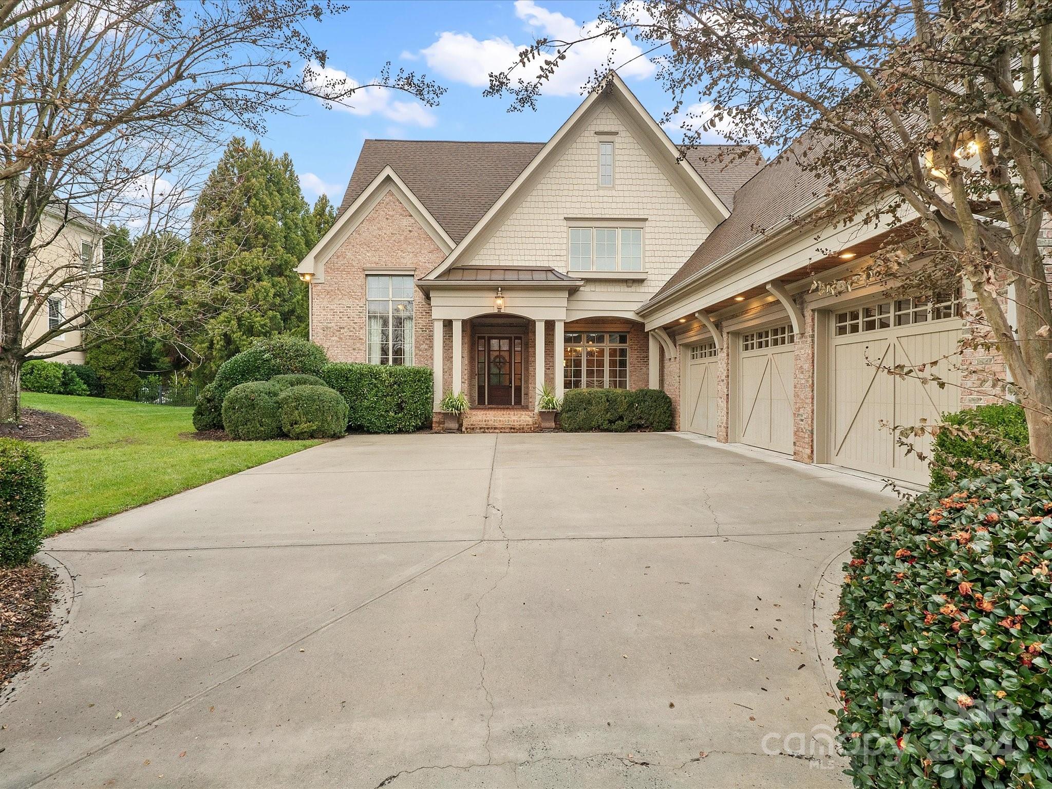 Custom full brick home in prime South Charlotte neighborhood! Arrive to a welcoming covered front porch and spacious 3-car garage. The kitchen features granite countertops, a breakfast bar, walk-in pantry, stainless steel appliances, double ovens, gas cooktop, and custom hood range, all opening to a cozy living room with a gas fireplace and built-ins. Sliding French doors open to a gorgeous screened-in porch overlooking the private, fenced backyard. The main level includes a drop zone and a laundry room with a sink and washer/dryer conveying. The spacious primary suite had new carpet installed this month and features double closets and a bathroom with an oversized frameless shower. A dedicated office space is tucked away from the bedrooms. Upstairs offers a huge bonus/flex space. 2022 roof replacement offers peace of mind. Located between South Park and Ballantyne, it’s close to shopping, dining, and top-rated schools. Don't wait - schedule your showing today!