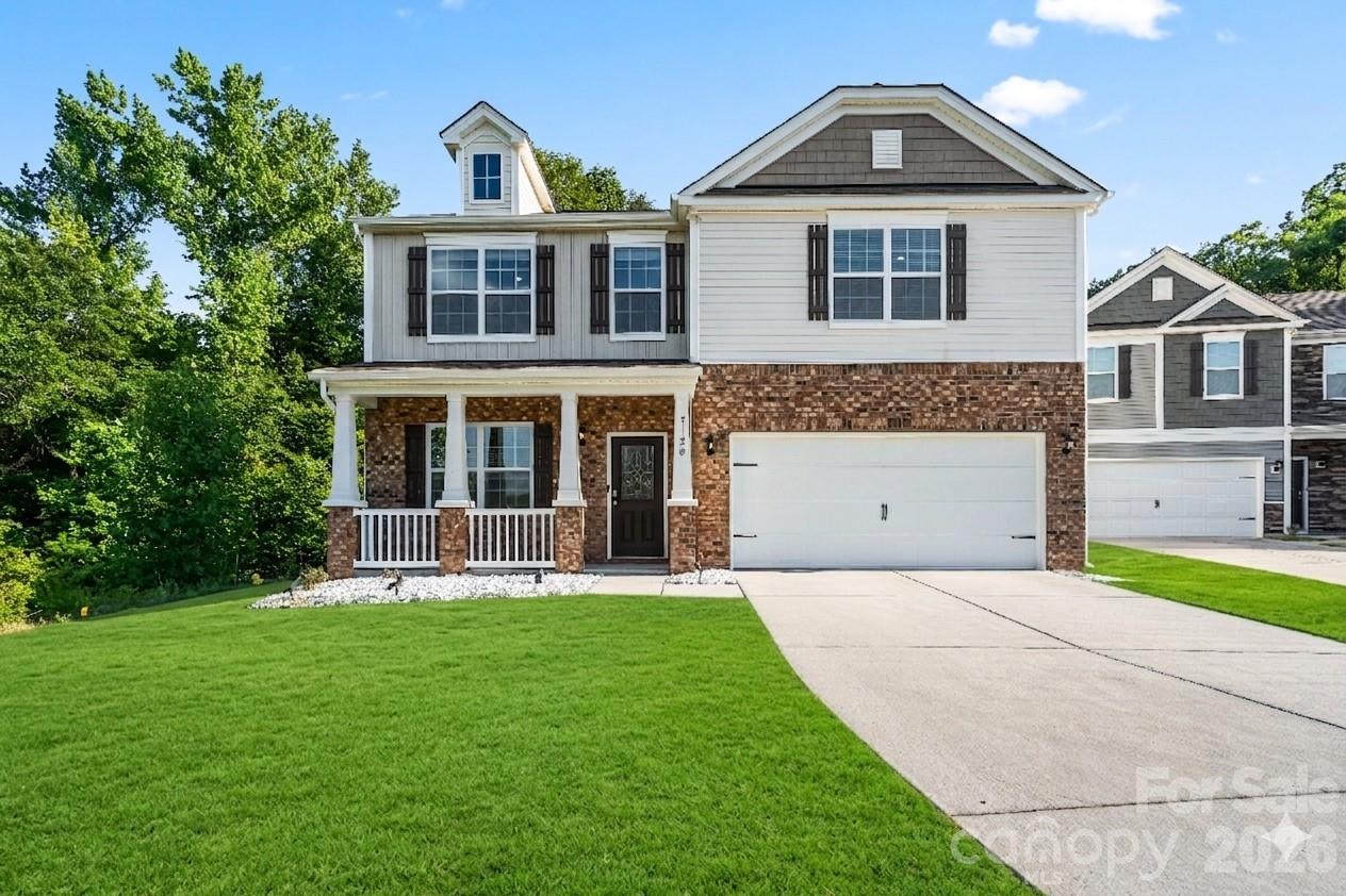 Welcome home to 7128 Bandera Dr — a spacious, beautifully appointed home on a quiet cul-de-sac in one of West Charlotte's most connected locations.

With nearly 2,900 square feet, 4 bedrooms, and a dedicated home office, this two-story home delivers the flexibility today's buyers demand — whether that's a work-from-home setup, a guest suite, or simply room to breathe.

The open-concept main level is anchored by a chef-inspired kitchen featuring granite countertops, white shaker cabinets, stainless steel appliances, and a large center island with bar seating. Hardwood floors run throughout, tying the kitchen and living spaces together in a layout that's made for both everyday comfort and entertaining.

Step outside through the glass doors to your own private escape. The patio backs to a lush, wooded buffer of mature trees that creates natural privacy and a serene, nature-filled backdrop — the kind of outdoor setting you'd expect at a higher price point. For those who love quiet mornings outside or evening gatherings without neighbors looking in, this backyard delivers.

A classic brick facade, covered front porch, and two-car garage round out the home's exceptional curb appeal.

Minutes to I-485, I-85, Charlotte Douglas International Airport (~10 min), the U.S. National Whitewater Center (~15 min), and the best of Charlotte's dining, shopping, and employment corridors.

Space, privacy, and an unbeatable location — priced below the competition. Schedule your showing today!