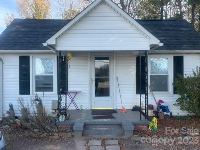 Nice home with hardwood floors and in great location.  New roof and has been well maintained with some updates. Walking distance to Downtown Davidson and local businesses. Home occupied by tenant, great investment opportunity right outside of Mecklenburg County city limits.  Shared well, septic and driveway with neighboring property. Neighboring property is 1891 Mecklenburg Hwy which has 3 tenants in place.  Currently the commercial building has new HVAC updated and new roof. Great investment property for 1 price.