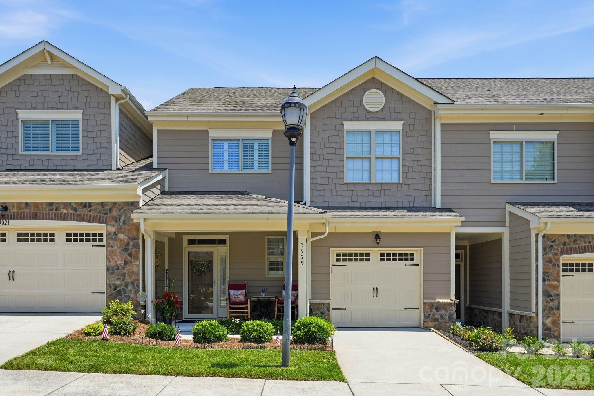 Welcome to this beautifully maintained 3-bedroom, 2.5-bath townhome offering a peaceful golf course setting with a tree-lined backdrop that provides both scenic views and added privacy. Built in 2018, this move-in-ready home features an open and inviting floor plan designed for comfortable everyday living and effortless entertaining. The spacious kitchen offers an island, pantry, and ample cabinet space, flowing seamlessly into the dining and living areas. The desirable main-level primary suite provides convenience and privacy, complete with a walk-in closet and en-suite bath. Upstairs, you’ll find two additional bedrooms and a full bath, offering flexible space for guests, a home office, or hobbies. Step outside to enjoy the rear patio, where you can relax and take in the peaceful golf course setting surrounded by mature trees. Additional highlights include an epoxy-coated garage floor, a whole-house HEPA filtration system integrated with the heat pump, and a new hot water heater installed in 2026. Conveniently located near shopping, dining, and parks. This home offers the perfect blend of low-maintenance living, thoughtful upgrades, and a private natural setting.