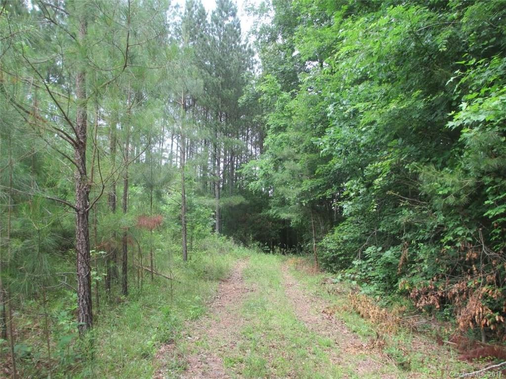 Acreage that offers beautiful wooded setting and privacy in the Buford area. Septic permit is on file and home site has been partially cleared. Zoning allows modular, manufactured and stick built homes.