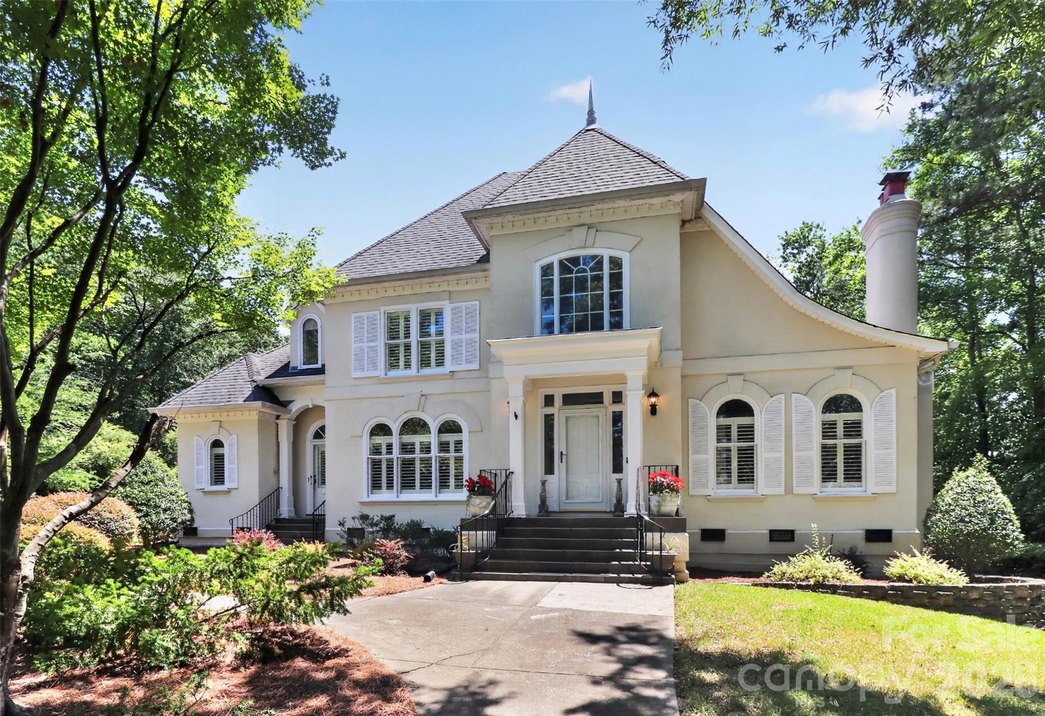 Space, style and comfort come together in this stunning stucco home situated on a generous 0.59 acre Cul-De-Sac lot. Featuring four bedrooms, four and a half baths, a luxurious main level primary suite with updated master bath in 2025. Sun-filled living spaces, finished basement with rec room, office, flex space. This home truly has room for everyone. The chef’s kitchen offers a gas range, oversized island, breakfast bar, and two pantries. Open dining room and living room, light-filled sunroom, overlooking backyard. Second Primary Bedroom upstairs with an en-suite bathroom. Three fireplaces add warmth and charm throughout the home. Just minutes from shopping and dining. Located in one of the area’s most sought-after communities. New HVAC 2025