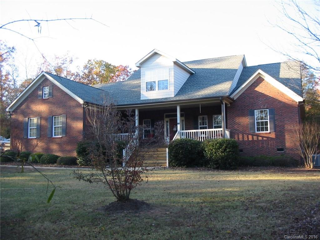 Very nice 4 bedroom 3 bath 1 1/2 story on large lot, hardwoods, tile, master on main, heavy moldings, designer kitchen with 42" cabinets, granite, fireplace, 2 car garage, new A/C downstairs with 10 year warranty, lots of privacy on the large 2.45 acre lot