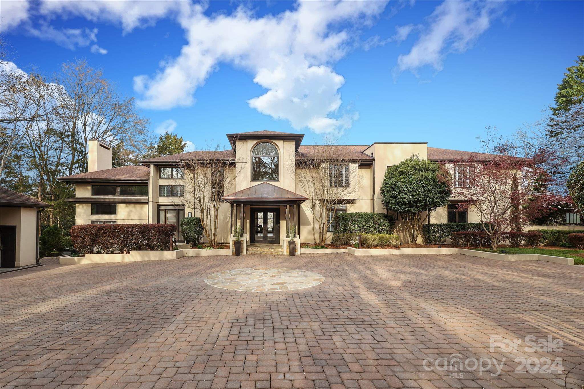 Introducing a resort-like oasis nestled in a serene setting, complete with pool and recreational room. This exquisite property offers a blend of elegance and relaxation, providing an ideal retreat for both leisure and entertainment. With timeless updates and beautiful grounds, this listing presents a lifestyle of unparalleled comfort and enjoyment. Updates and features include: pool and pool house with bathroom, kitchen, shower, and changing rooms, renovated interior bathrooms, renovated kitchen, expansive landscaping,  gated entry, custom staircase railing, custom maple woodwork, 3 car garage, and so much more. Located in Quail Hollow, in the heart of SouthPark, close to shopping, dining, and Quail Hollow Country Club. Come and see all that this incredible home and property have to offer.