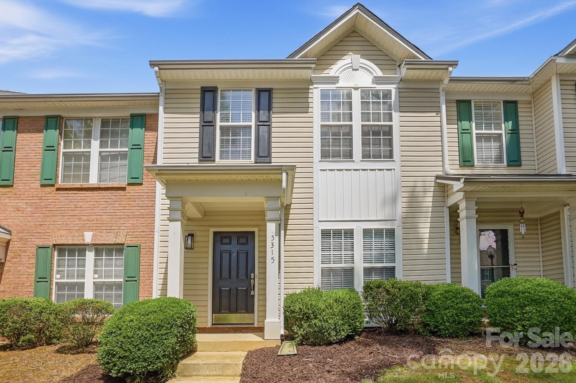 This move-in-ready property features a functional main floor with a kitchen equipped with stainless steel appliances, a dedicated office space, and open dining and living areas. The private back porch and patio, which includes a convenient storage closet, offer excellent space for relaxing or entertaining. Upstairs, you will find two spacious bedrooms and a full bathroom, including a primary suite with a generous walk-in closet.

The community provides an outdoor pool, clubhouse, and pet waste stations. HOA dues cover water, sewer, trash, recycling, lawn care, and exterior maintenance. Please note that as of March 1, 2026, HOA dues have increased to $225.13 per month.

The unit includes two assigned parking spots, with additional guest parking available at the clubhouse near the community entrance. Conveniently located near I-77, I-485, and I-85, the home is within walking distance of local restaurants and shopping.
