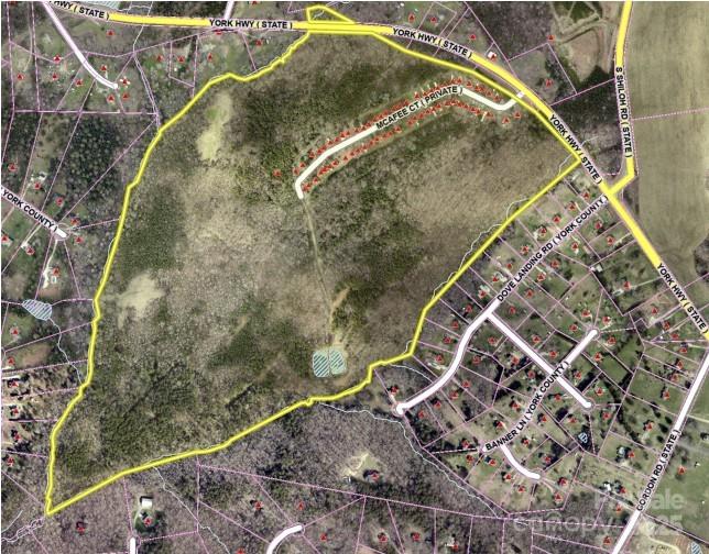 Stunning 158 tract of land on Hwy 5 zoned RUD with over 2200 feet of road frontage on Highway 5. Perfect for single family development.  This sprawling landscape with rolling hills and abundant trees is minutes from York's shopping, dining and schools.  104 Lot Preliminary Plat approved by York County. Hwy 5 is publicly maintained and McAfee Road is privately maintained.  Call now for details!