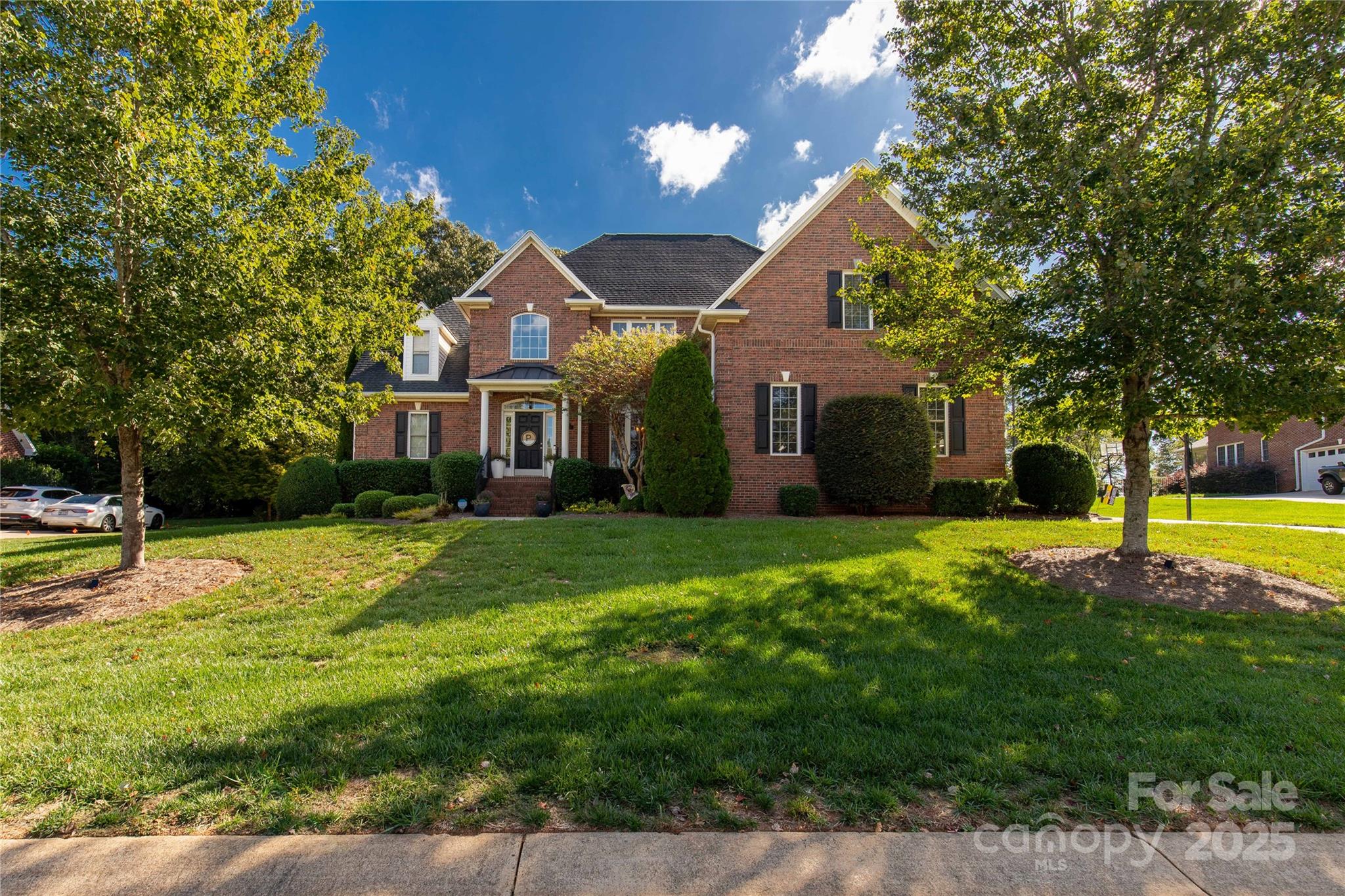 Welcome to your dream home located in the well established Graystone Estates in Belmont, NC. A one owner, fully brick home offers newly remodeled features and luxurious amenities. Prepare to entertain in your outdoor oasis consisting of a fully fenced in backyard with a large saltwater pool, large covered back porch with access from great room and primary, screened in back porch area with access from kitchen. 1st floor consist of updated kitchen with large island, lots of storage, modern light fixtures, laundry room, two-story style great room with fireplace, formal dining room with upgraded light fixture, full bath that has been remodeled for guest, bedroom with easy access to full bath, expansive primary bedroom with tray ceiling that leads to the remodeled primary bathroom and walk-in closet. Attached two car garage. 2nd floor consist of two bedrooms, remodeled jack-and-jill bath, and a huge bonus/bedroom with a large closet. This home is located minutes from downtown Belmont with easy access to Charlotte airport and major highways. This home has so much to offer, it is elegant and thoughtful at every turn!