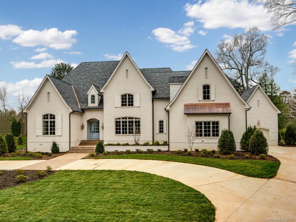 Spectacular NEW construction! This elegant, French Normandy inspired farmhouse sits on a beautiful, flat 1.1 acre lot in Southpark, offering both privacy and convenience. Open floorplan with 10' ceilings down, 9' ceilings up. Designer selections throughout, including reclaimed wood beams, living room and covered terrace masonry fireplaces, custom paneling and molding, hardwood and marble flooring, marble countertops, custom cabinetry and high-end finishes. A must-see!