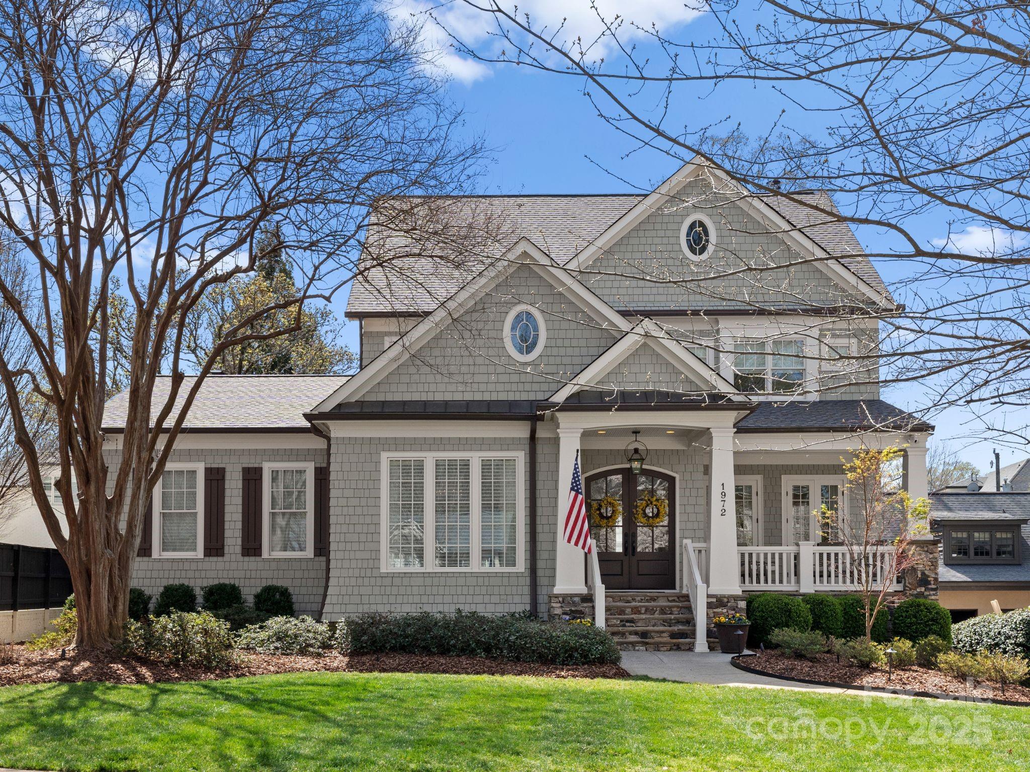 This elegant and charming home is located in the heart of Myers Park, and is walking distance to Freedom Park, the Greenway and boutique shops and restaurants. The main level features a large sunny great room w/ a coffered ceiling, Tennessee flagstone fireplace, custom window seats and is open to the Emily Bourgeois designed kitchen. The kitchen has custom inset cabinets, commercial grade appliances, a large walk-in pantry and a bright beautiful breakfast nook. Off of the kitchen is a wonderful covered porch & gas log fireplace. The primary suite is on the main level as well as a large laundry room, dining room, living room w/ its own covered porch & separate hidden office. The upper level offers 4 bedrooms and 2 full baths. There are permanent stairs to the large full-length attic that could be finished for future use. The lower level has an exercise room, office and additional bonus room that could be used as a 6th BR. There is also a full bath, wine cellar and walk in storage.