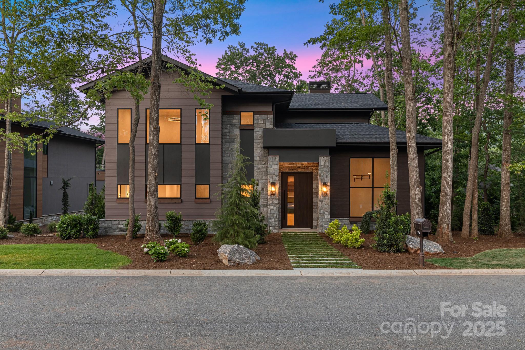 Exquisite Luxury Living in The Cliffs at Walnut Cove.
Welcome to this stunning luxury residence, expertly designed to blend sophistication and comfort for the ultimate mountain lifestyle. This elegant home features three spacious bedrooms, each with its own private ensuite bathroom, providing a peaceful retreat for family and guests alike.

Every detail of this home showcases high-end finishes and expansive windows that flood the interiors with natural light, creating a bright and inviting atmosphere. Situated within the secure, gated community of The Cliffs at Walnut Cove, residents enjoy access to world-class amenities including a championship golf course, clubhouse dining, a state-of-the-art wellness center, and scenic hiking trails.

Experience the perfect combination of elegance, privacy, and resort-style living—make this exceptional home yours today!