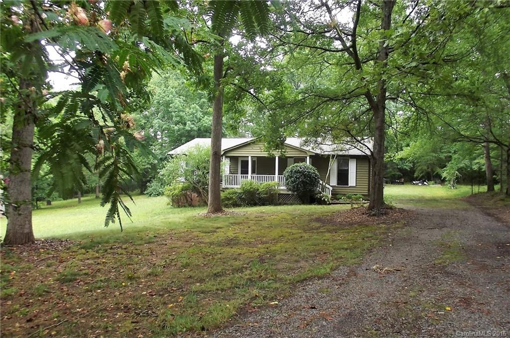 Everything you're looking for!  Inviting rocking chair front porch for summer breaks.  Open floor plan full of light with three roomy bedrooms and two full baths.  Gorgeous sunroom overlooking a 1.5 acre wooded lot.  New HVAC and dish washer.  Roof is almost new and was replaced in 2011.  High performing Clover schools and great location with easy commute to the lake and Charlotte.  Move in ready and ready to add your own touches.  See it today!
