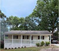 Welcome to this charming 2-bedroom, 1-bath home nestled in a cul-de-sac on 1.32 peaceful acres in desirable Kings Mountain! Full of character and warmth, this cozy retreat is waiting for its new owners. Since purchasing the home, the current owner has made several updates, adding to its appeal and making it move-in ready while still leaving room for you to add your own personal touch. Improvements include remodeled bathroom, updated flooring, and refreshed paint. Outside, the owner has invested considerable effort in enhancing the property’s curb appeal and usability by clearing portions of the trees and land to create a more open and inviting setting. Beautiful landscaping, decorative shrubs, and a charming garden area at the front of the home add warmth and character, while the concrete sidewalk and carport provide additional convenience. These improvements have made the property even more appealing and move-in ready. Enjoy the tranquility of a quiet neighborhood and create your own private retreat surrounded by nature and peaceful surroundings. Whether you’re looking for a starter home, downsizing, or simply seeking a relaxing escape, this property offers the perfect blend of comfort and charm. Conveniently located near shopping, dining, and just minutes from the new Catawba Two Kings Casino, you’ll appreciate the combination of peaceful country living with easy access to modern conveniences. Don’t miss this wonderful opportunity to make this charming home your own—schedule your showing today!