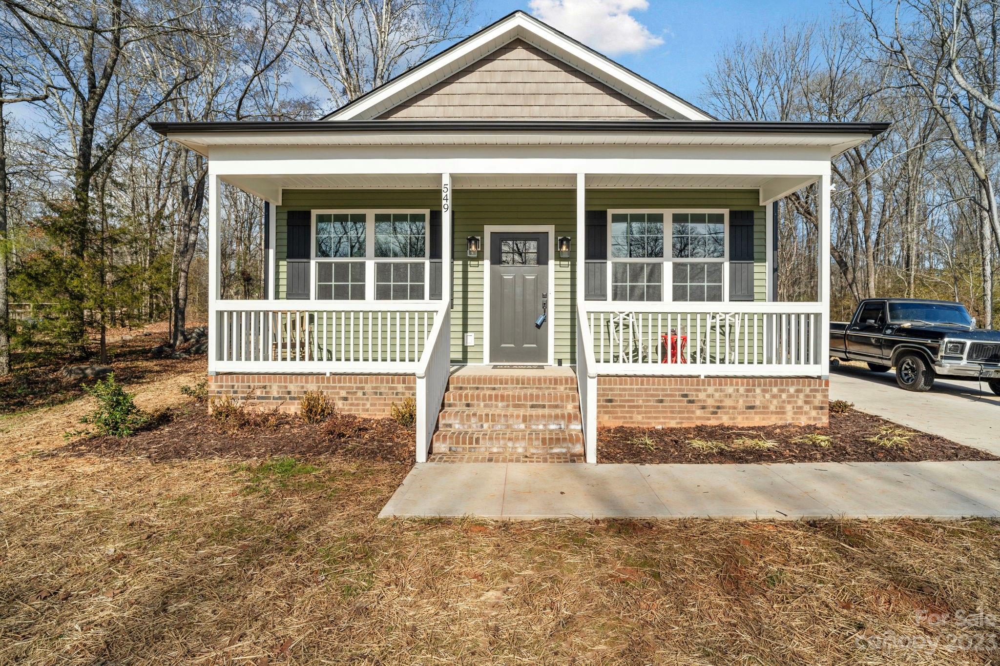 Welcome to your dream home! This stunning house was newly constructed and offers modern elegance with exceptional quality. With close proximity to many schools, I-77 access, and Rock Hill's downtown district, this home combines style, comfort, and location. This spacious 3-bedroom, 2-bathroom home is perfect for families or those who appreciate a touch of refined simplicity. Step inside to find an open-concept design with a bright and inviting living room, a spacious kitchen with hand-selected appliances, and a dining area that looks out towards the front of the home. The primary bedroom is a true retreat with it's own tub/shower combo in the primary bathroom as well as a walk-in bedroom closet. High-end finishes with meticulous details make this house stand out. Enjoy the convenience of a concrete driveway that leads to a side porch entrance while making note of the beautifully landscaped yard. Don’t miss your chance to make this masterpiece your own!