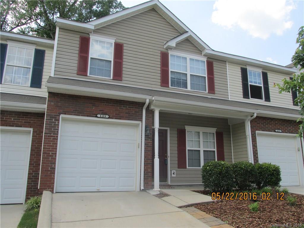 Affordably priced townhome with a one car garage in Fort Mill. Fort Mill schools!  Open floor plan with 42 inch cabinets in kitchen.  French doors leading out to a privately wooded yard.  Lawn maintenance, water/sewer, termite bond and pool all included in the HOA fees.  Upstairs has two bedrooms with a loft and an extra room that can be used for a playroom or an office.