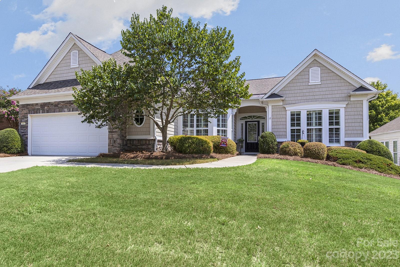 Lovely Cumberland Hall w/ a sunroom in Sun City! Lots of curb appeal w/ the partial stone veneer front & a decorative glass front door, this home sits on a large lot/quiet cul-de-sac street. Kitchen features: granite counters, SS appliances, glass cooktop, wall oven & microwave, large island, pantry, & a sunny breakfast nook! Cozy up to the gas-log fireplace (w/ an accent wall) in the great room during the cooler months & enjoy the spacious sunroom w/ tile flooring & tons of natural light. The primary suite has a tray ceiling & a bathroom w/ a garden tub, dual sink vanity, & a custom, frameless glass shower! 2 guest bedrooms share a full bath w/dual sink vanity. There is also a den/office- ideal for working or hobbies! A beautiful paver patio w/ landscaping is a great place to relax, grill out, & host friends & family! Other features: HVAC replaced in 2019, plantation shutters, 2-car garage w/ side bump-out & floor covering, added storage closet, oversized downspouts, & so much more!