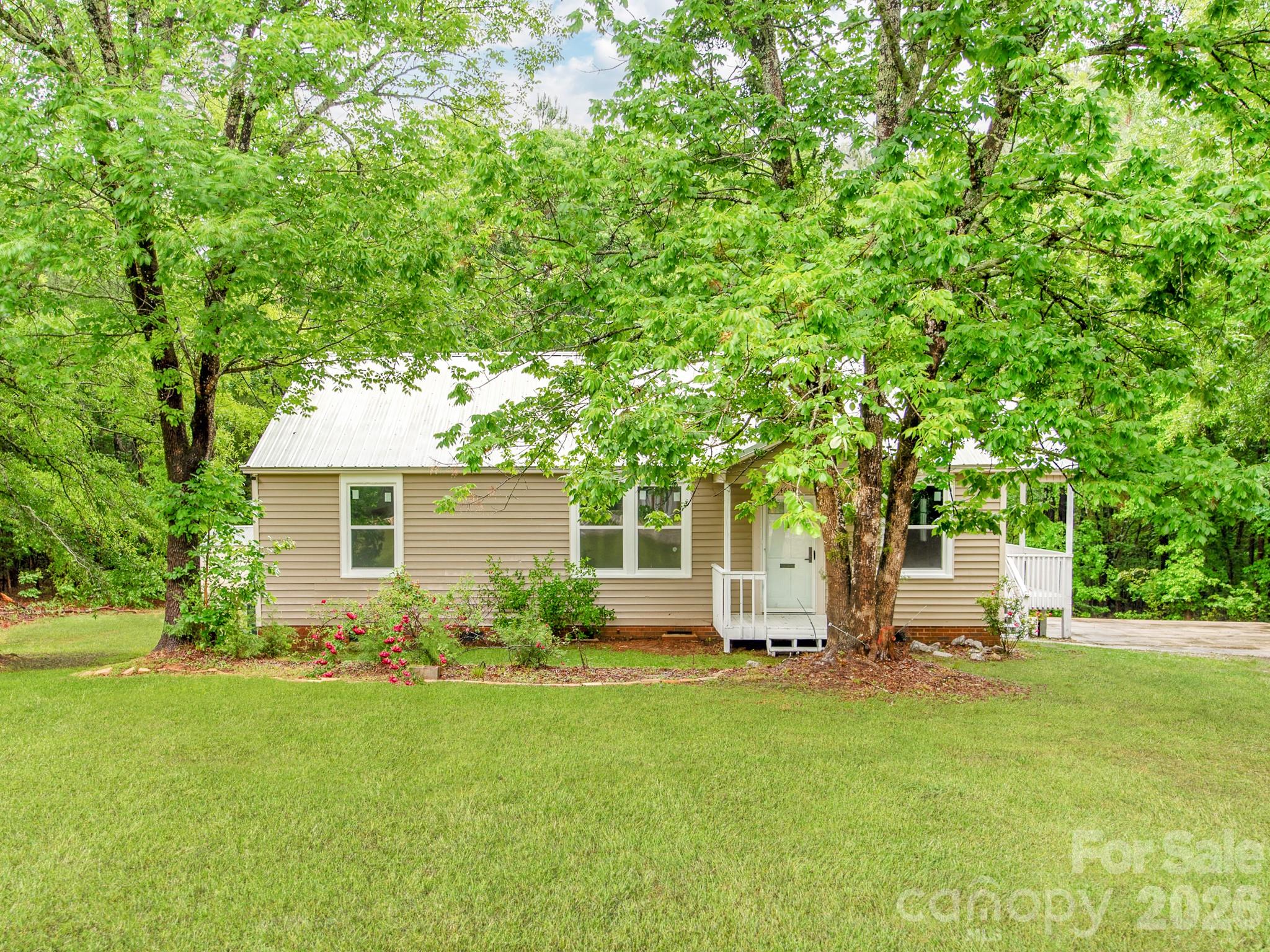 Beautifully renovated home situated on approximately 1.7 acres in a peaceful Lancaster setting, offering the perfect combination of modern updates, comfortable living, and spacious outdoor surroundings! This thoughtfully updated 3 bedroom, 2 bathroom home features an inviting layout with abundant natural light and a warm, welcoming atmosphere throughout. The fully renovated interior showcases updated flooring, fresh finishes, stylish fixtures, and a beautifully refreshed kitchen designed for both everyday functionality and entertaining. The spacious living areas flow naturally from room to room, creating a comfortable and open feel while maximizing the home’s living space.

Both bathrooms have been tastefully updated with clean, modern touches, and the home’s renovation reflects quality craftsmanship and attention to detail throughout. Large windows allow natural light to fill the interior while providing views of the surrounding property and peaceful natural setting.

Outside, the expansive 1.7-acre lot offers exceptional flexibility and privacy with plenty of room to enjoy outdoor living, gardening, recreation, or future possibilities. The property provides the feel of country living while still maintaining convenient access to nearby shopping, dining, schools, and everyday amenities. Whether relaxing outdoors, entertaining guests, or simply enjoying the extra space and privacy, this property delivers a lifestyle that is increasingly hard to find.

Move-in ready and beautifully updated, this home offers a rare opportunity to own a fully renovated property with acreage, modern comfort, and a serene setting all in one.