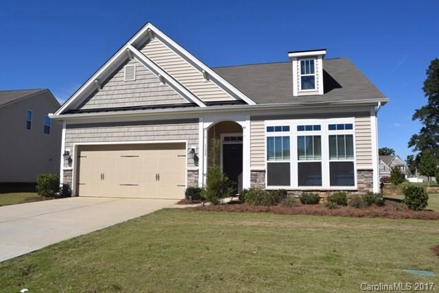 Easy living in this open floor plan.  Most living space on main level with exception of a bedroom, full bath and bonus room upstairs. Granite kitchen with stainless appliances and a 13' work island/bar.  Office space with french doors as well as a dining area that is open to the kitchen and great room. Great Room has a fireplace and built-ins. Awesome neighborhood amenities.  Clover school district.