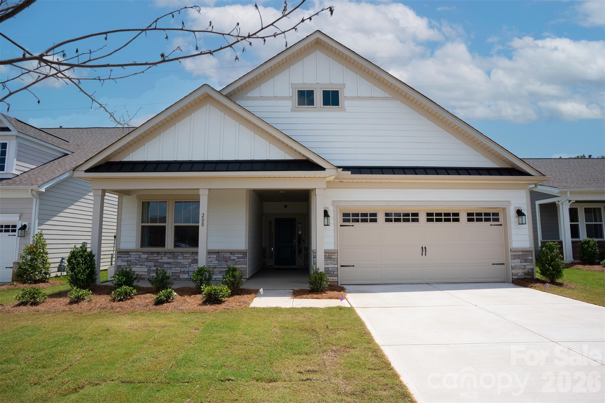 This former model ranch home, built in 2021, is a must-see. A covered front porch welcomes you inside, where an open-concept layout connects the main living spaces. The kitchen features quartz countertops, stainless steel appliances including an electric range, a center island with additional seating and storage, and a dining area. The kitchen flows into the living room, which offers direct access to the screened porch and outdoor living spaces.

The primary suite features a tray ceiling, a walk-in closet, and access to the screened porch. The ensuite bath is complete with a walk-in shower and double vanity. The main level also includes a convenient drop zone and laundry room. 

Step outside to enjoy thoughtfully designed outdoor living areas, including a screened porch, a paver patio with a built-in grilling station, and a separate seating area beneath a pergola—ideal for relaxing or entertaining.

Residents of this active adult community enjoy an exceptional selection of resort-style amenities, including a heated pool, cabanas, outdoor fireside seating, pickleball and bocce ball courts, a fitness center, walking trails, a dog park, and more. The HOA also provides year-round lawn maintenance, allowing for low-maintenance living.

Conveniently located near shopping, dining, and everyday conveniences, this home offers the perfect blend of comfort, lifestyle, and community.