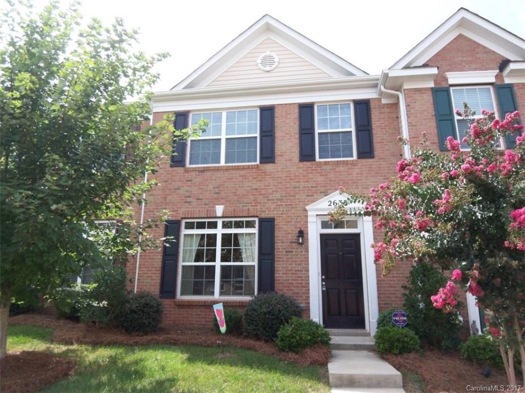MOVE-IN READY, beautiful 2-story brick front townhome w/gorgeous kitchen! Large island, tall cabinets & breakfast area. Living rm & dining area w/crown molding, chair rail & picture frame molding. 3 bedrms upstairs. Master bath w/separate tub/shower. All bedrms have vaulted ceilings & decorative ledges. Enclosed patio & grassy area. Outside storage closet. Majority of lawn & landscaping care included in HOA (owner responsible for inside patio area). Community Pool. Close to Ballantyne & 485!