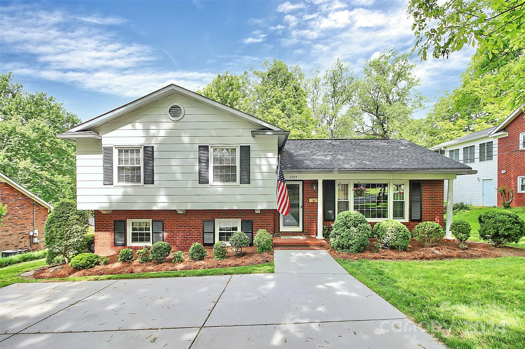 Location! Location! Big Price Reduction! Split level design in highly coveted neighborhood! Great Schools! Long time homeowner who has maintained the property well. Nicely Landscaped with honeysuckle, Azaleas, Dogwoods, and more. All appliances included.....kitch appliances less than 3 years old. Large Lower family Rm/Den sports hardy pine walls and built-in shelves where you can cozy up to a gas log fireplace. Lower flex bedroom well suited for office space.  Upper Primary bath is back to back half and full bath. Homeowner has done some Kitch & bathroom updating through the years. All flooring in the house is either wood, laminate, or tile. HVAC less than 5 years old! Large backyard with patio and shed. Additional storage in the Attic. Circle driveway provides for ample parking and easy maneuvering. Nearby Recreation membership options include Olde Providence Racquet Club and Windyrush Country Club. Home is just minutes from the park and the Arboretum. Don't miss it!