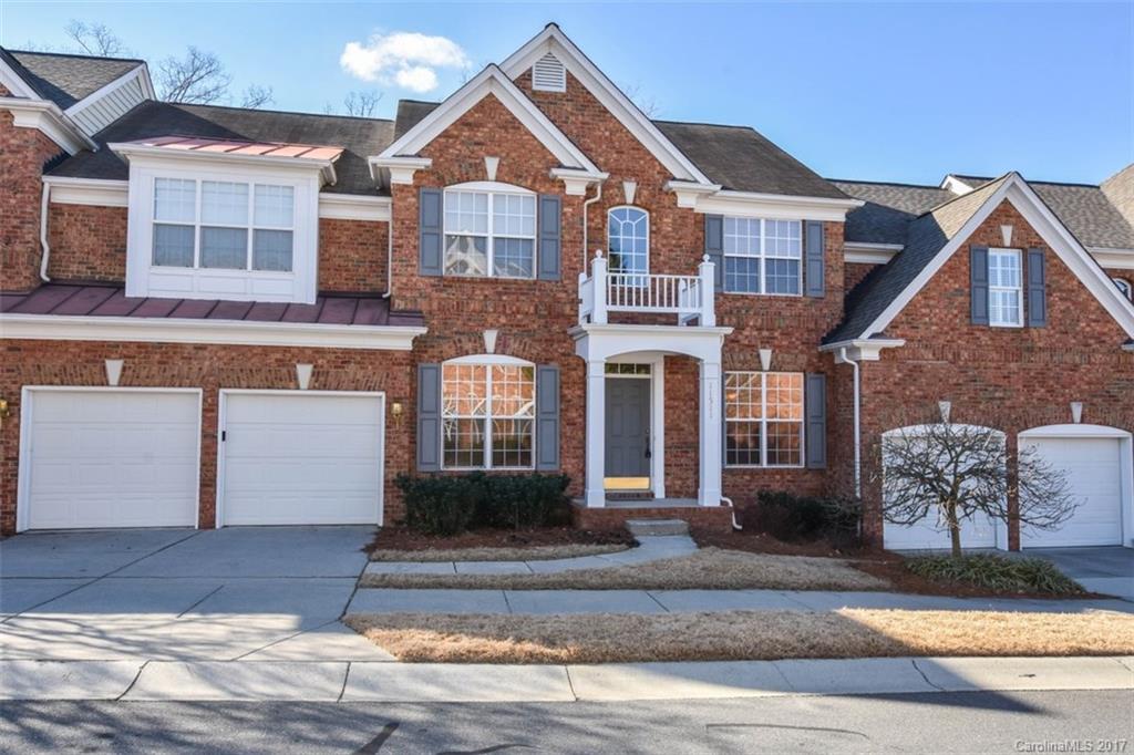 Great value on this wonderful 2-story townhome with huge unfinished basement. Priced to sell!! This floorplan has 3 bedrooms, office and loft! Beautiful hardwoods, tray ceilings, arched entryway, and columned entryways.  New Carpet and recently painted. Large kitchen with granite counter tops and SS appliances. Beautiful great room with fireplace. Partial views of Ballantyne Country Club golf course in rear. Master BR on main level and 2 car garage. Easy walking distance to Ballantyne Village.