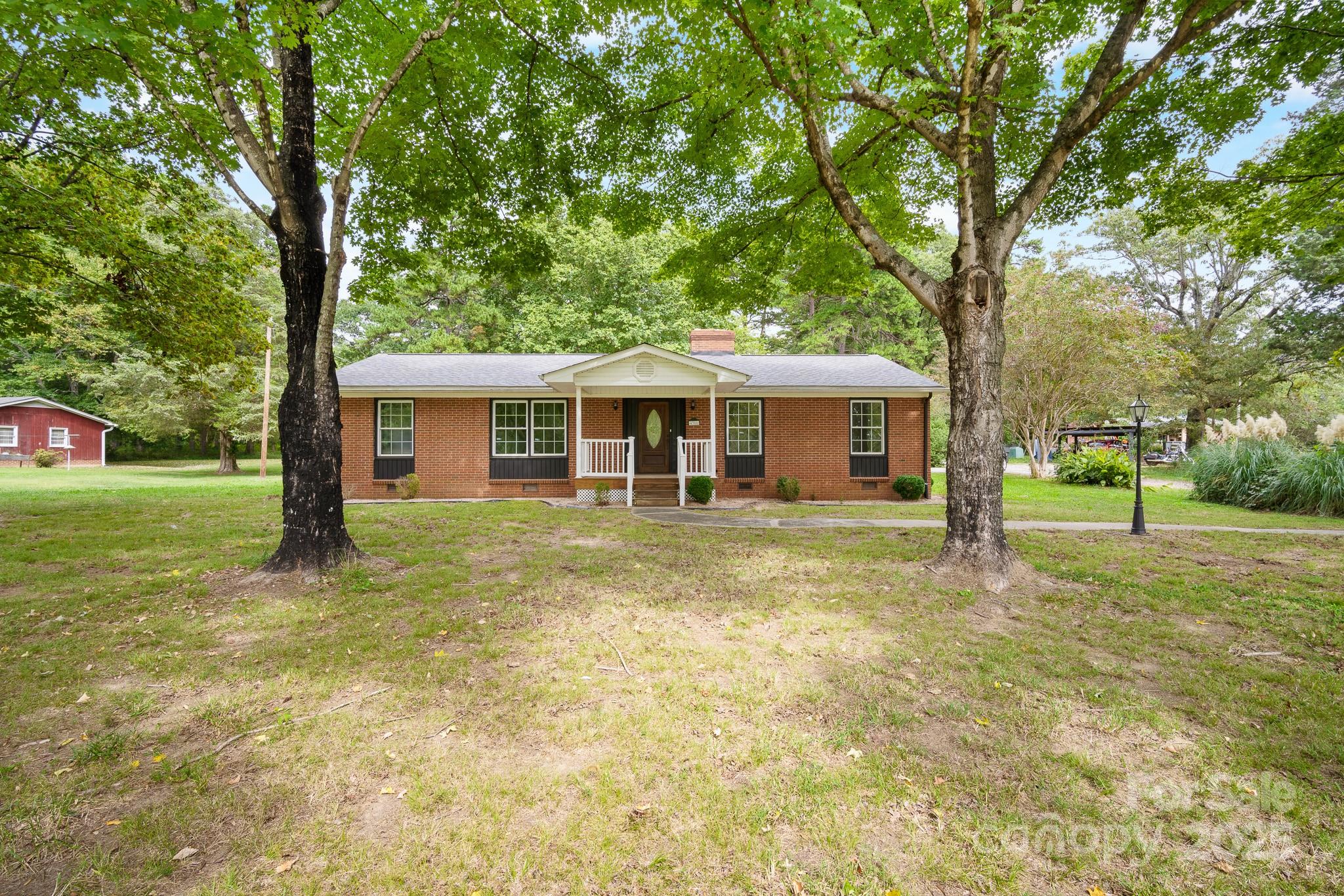 Beautifully updated 3BR/2BA brick ranch on over 0.6 acres in Rowan County! Enjoy a renovated kitchen with granite countertops and stainless steel appliances, plus LVP flooring throughout and refreshed bathrooms. Recent upgrades include HVAC, roof, and water heater all replaced within the last 3 years. Spacious 2-bay carport, large yard, and a truly move-in ready home perfect for comfortable living!