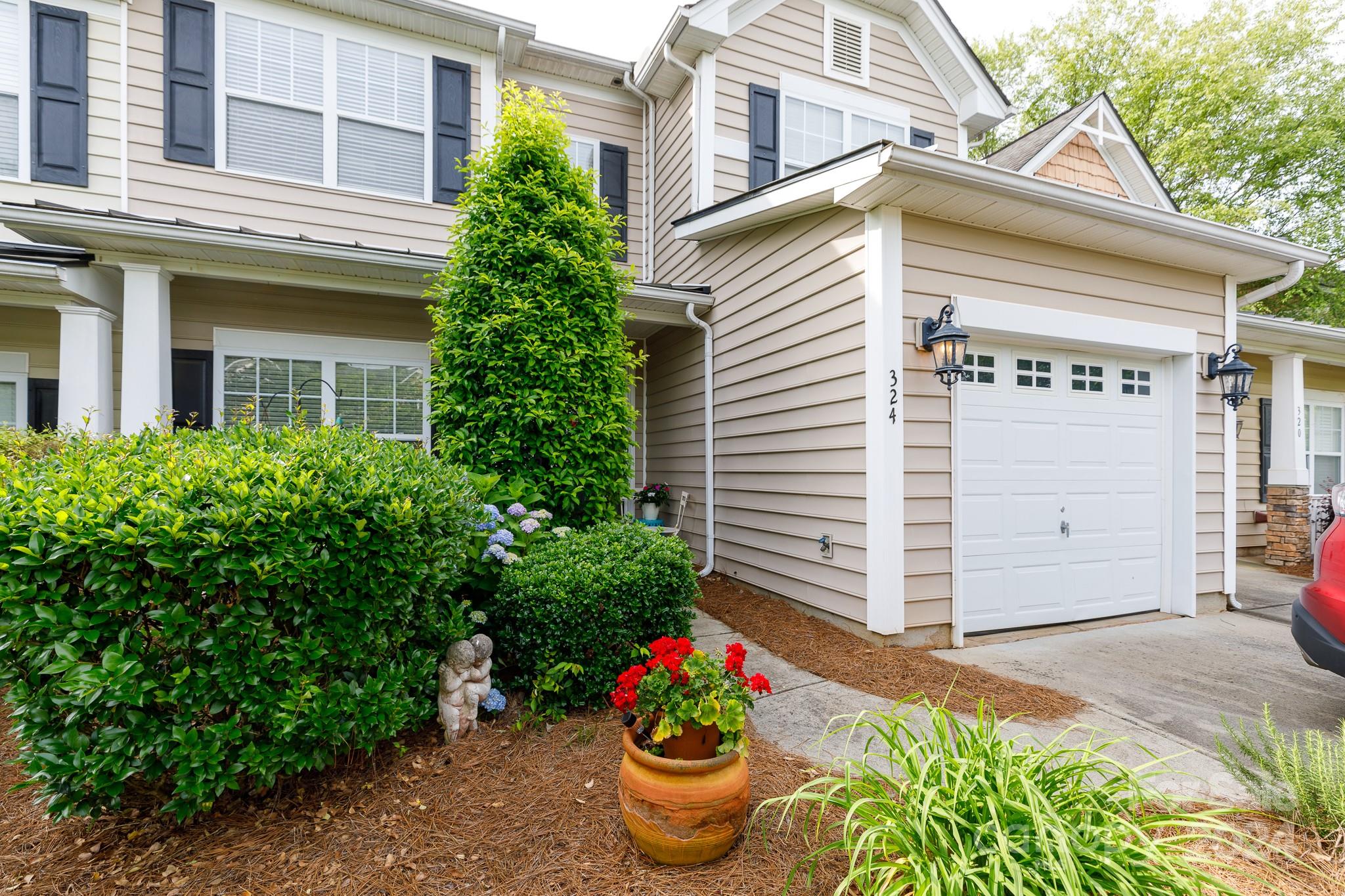 Lovely 3 bedroom and 2 1/2 bath open plan townhome that is conveniently located for access to medical facilities, shopping and I-77.  Seller has invested over $13k in upgrading the primary bathroom and over $1k for awesome gas logs controlled by remote or switch on wall.  The view of beautiful landscaping and a front porch and back patio where enjoying your time outside will be a delight.  Bask in the sun at the kiddy pool and recreation area in the neighborhood. Seller just replaced the HVAC May 2024.