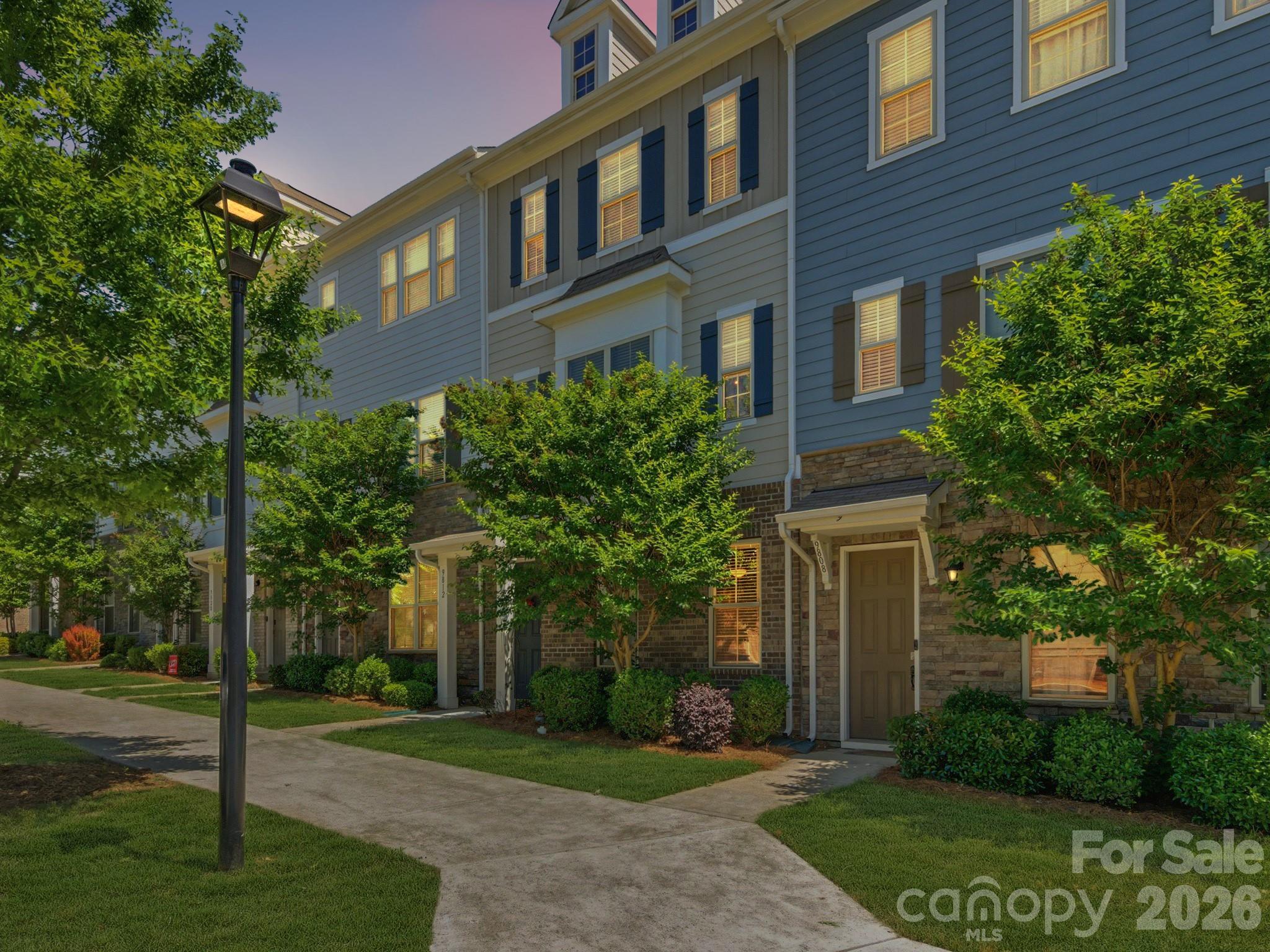 The search for “the one” ends here. Filled with natural light and thoughtfully upgraded throughout, this 2020-built home in Hadley at Arrowood Station offers a noticeably more elevated feel than anything else in its price point. From the moment you step inside, the difference is evident. Additional main-level windows flood the home with sunlight, creating a bright, airy atmosphere that instantly feels warm and inviting. Thoughtful updates and designer-inspired fixtures throughout give the space a polished, modern feel while still feeling comfortable and livable. The open-concept main living area was designed for both everyday living and effortless entertaining, seamlessly connecting the kitchen and living spaces. A custom built-in coffee/bar nook adds both charm and functionality — the kind of personalized touch buyers are searching for but rarely find in similar homes. Upstairs, spacious bedrooms and well-designed living spaces provide flexibility for guests, working from home, or simply having room to spread out. The spacious primary suite features a walk-in closet, double vanity and semi-frameless shower. Every space has been beautifully maintained and carefully styled, making this home truly move-in ready from day one. Beyond the home itself, the lifestyle here is hard to beat. Residents of Hadley at Arrowood Station enjoy access to community amenities including an outdoor pool, while the nearby Arrowood Light Rail Station offers an easy commute to Uptown Charlotte- and beyond- in approximately 15 minutes — giving you the perfect balance of convenience, connectivity, and neighborhood living. With over 2,000 square feet, 4 bedrooms, 3.5 baths, modern upgrades, incredible natural light, and one of the community’s most desirable presentations, this home stands out for all the right reasons.