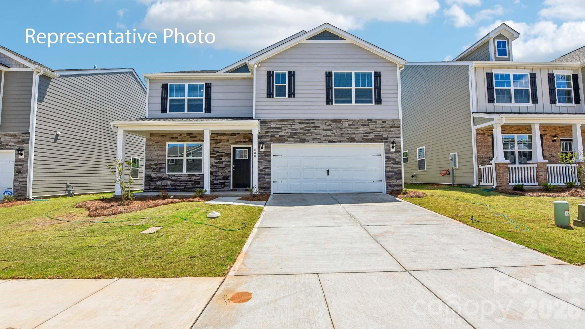 Our Hayden plan with open concept with guest bedroom, full bath, and office down, incredible open concept kitchen. Upstairs a spacious owners suite with luxurious bath. 3 more beds, two baths and loft complete this #1 seller, all 2511 square feet of usable space! On a pool sized lot, nestled in our Lake Norman area lifestyle community in the hidden gem zip code 28673, Sherrills Ford!  A must see!!