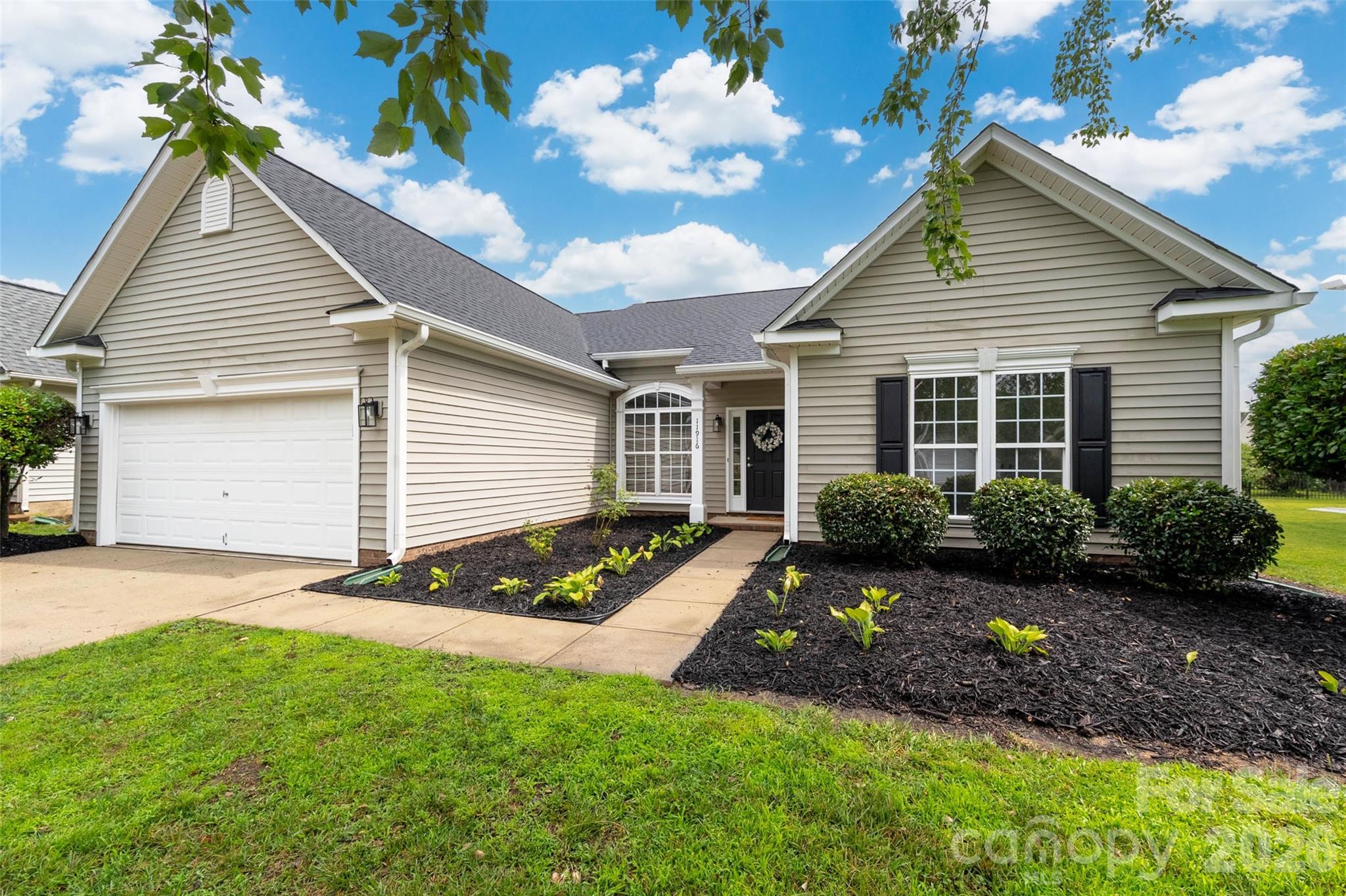 Move-in ready ranch home with a desirable split-bedroom floor plan in Planters Walk. Extensive recent updates include a new roof, gutters, HVAC system, significant window and glass updates, and new flooring throughout the home. The refreshed kitchen offers new quartz countertops, counter-height seating, updated fixtures, and opens to the main living area, ideal for both everyday living and entertaining. The private primary suite features an ensuite bath with a garden tub, while the secondary bedrooms are located on the opposite side of the home. Enjoy the ease of one-level living with no stairs. Additional updates include bathroom vanities, light fixtures and ceiling fans, a finished painted garage, extra insulation in attic, and fresh interior paint throughout. Outside, a flat backyard with fresh mulch offers space to relax, play, garden, or entertain. Located in Planters Walk, residents can enjoy a community pool, recreation area, walking trails, and convenient access to nearby parks, shopping, dining, and everyday conveniences. Easy access to I-485, Charlotte Douglas Airport, and the Lake Wylie area offers convenience for commuting, travel, and weekend recreation.