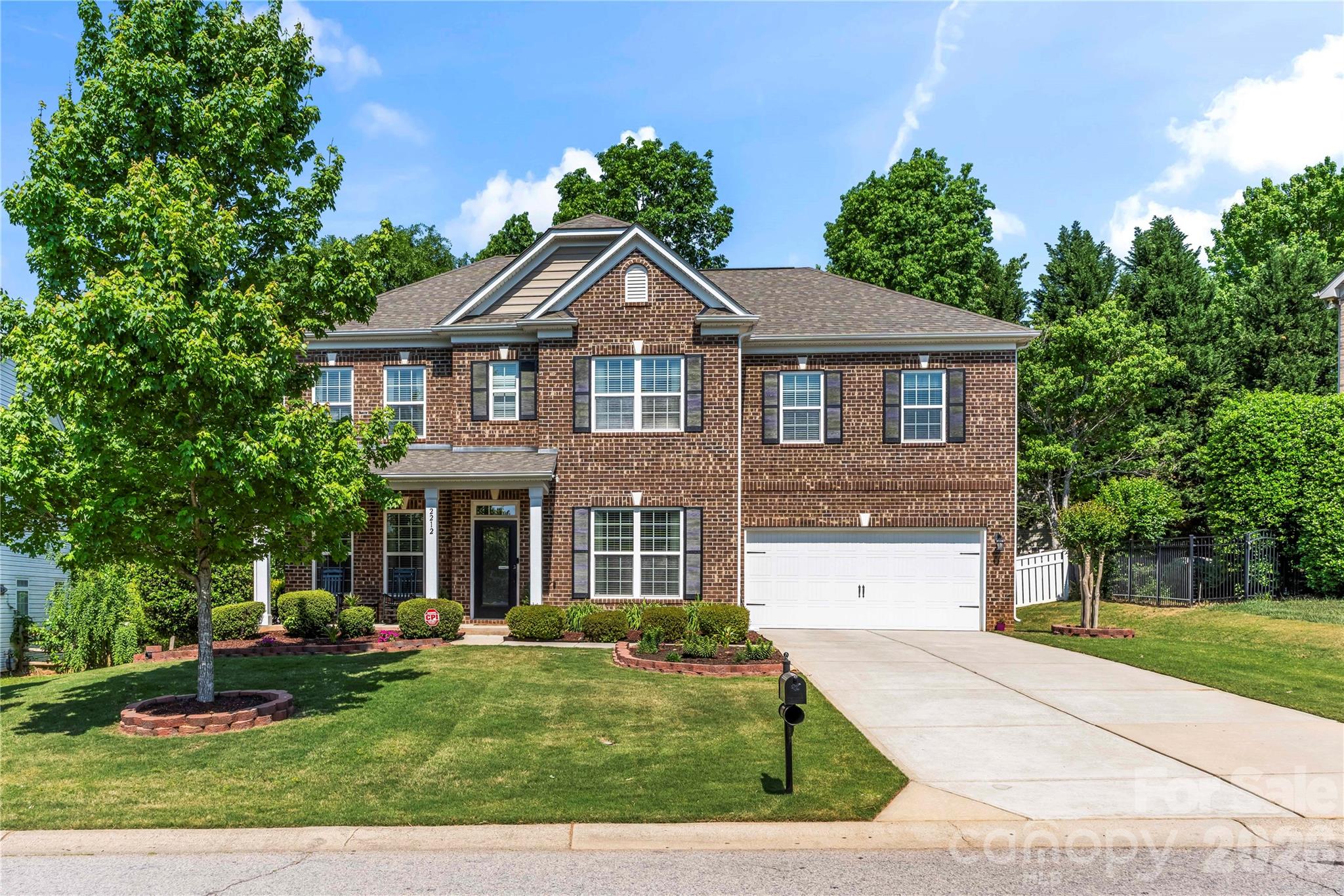 Welcome to this impeccably maintained, full brick home nestled in the desirable Mill Creek Falls community. Proudly owned by its original owners, this residence showcases true pride of ownership with thoughtful care and timeless appeal throughout, including major system updates with a new furnace and HVAC replaced in October 2025 for added peace of mind. A highly desirable main level guest suite offers added flexibility and convenience for visitors, multi-generational living, or a private home office setup. Step out back to enjoy a spacious fenced patio area and a cozy fire pit, perfect for relaxing evenings or entertaining guests. An in-ground irrigation system services both the front and backyard, helping maintain a lush, well-kept landscape year-round. Perfectly positioned for convenience, Mill Creek Falls offers easy access to Charlotte, local dining, hospitals, shopping, scenic trails, and everyday amenities, making it an ideal location for both relaxation and connectivity. Located within the highly sought-after, top-rated Clover School District (Lake Wylie High School), this home combines quality construction, prime location, and a lifestyle you’ll love.