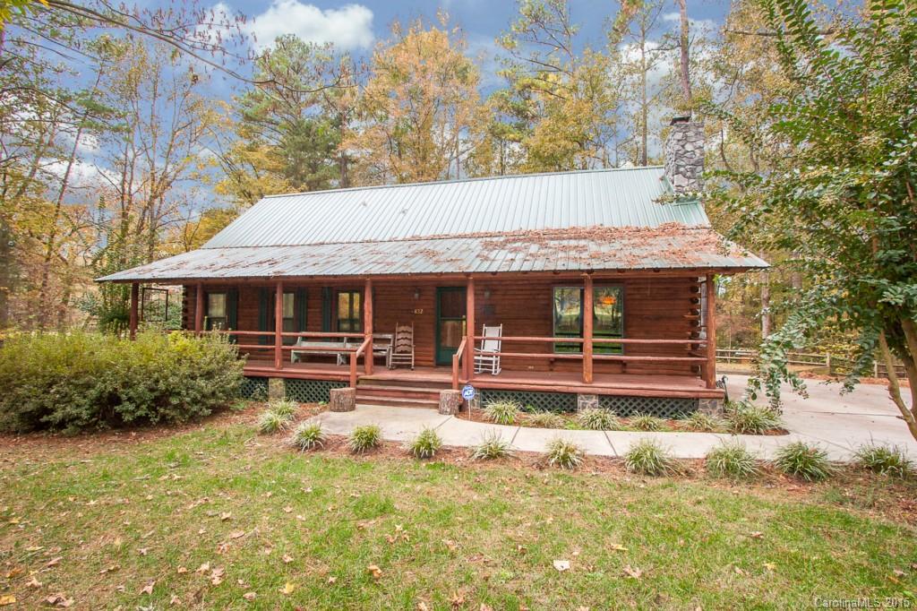 You’ll feel like you’re in the mountains yet you’re just minutes from downtown Rock Hill, the Aquatic center, shopping and dining and just 30 min from uptown Charlotte. This country retreat features a beautiful log home with updated kitchen, gorgeous wood accents and great outdoor living areas: front and back porches, patio with pergola and hot tub, charming shed and a cute tree house overlooking 6.4 acres with a pretty private pond and dock. Bring your horses!
