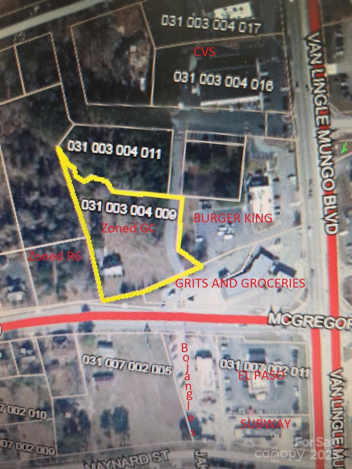 Attention Investors!  Parcel 031 003 004 009 is zoned General Commercial (1.39+- acres) and the adjacent Parcel 031 003 004 008 (.52+- acre lot) is zoned R-6 Residential. There is an old house on Parcel 031 003 004 009 that is in a poor state of repair. There is an easement road along the East side property line of Parcel 031 003 004 009 leading to the CVS parking lot.
