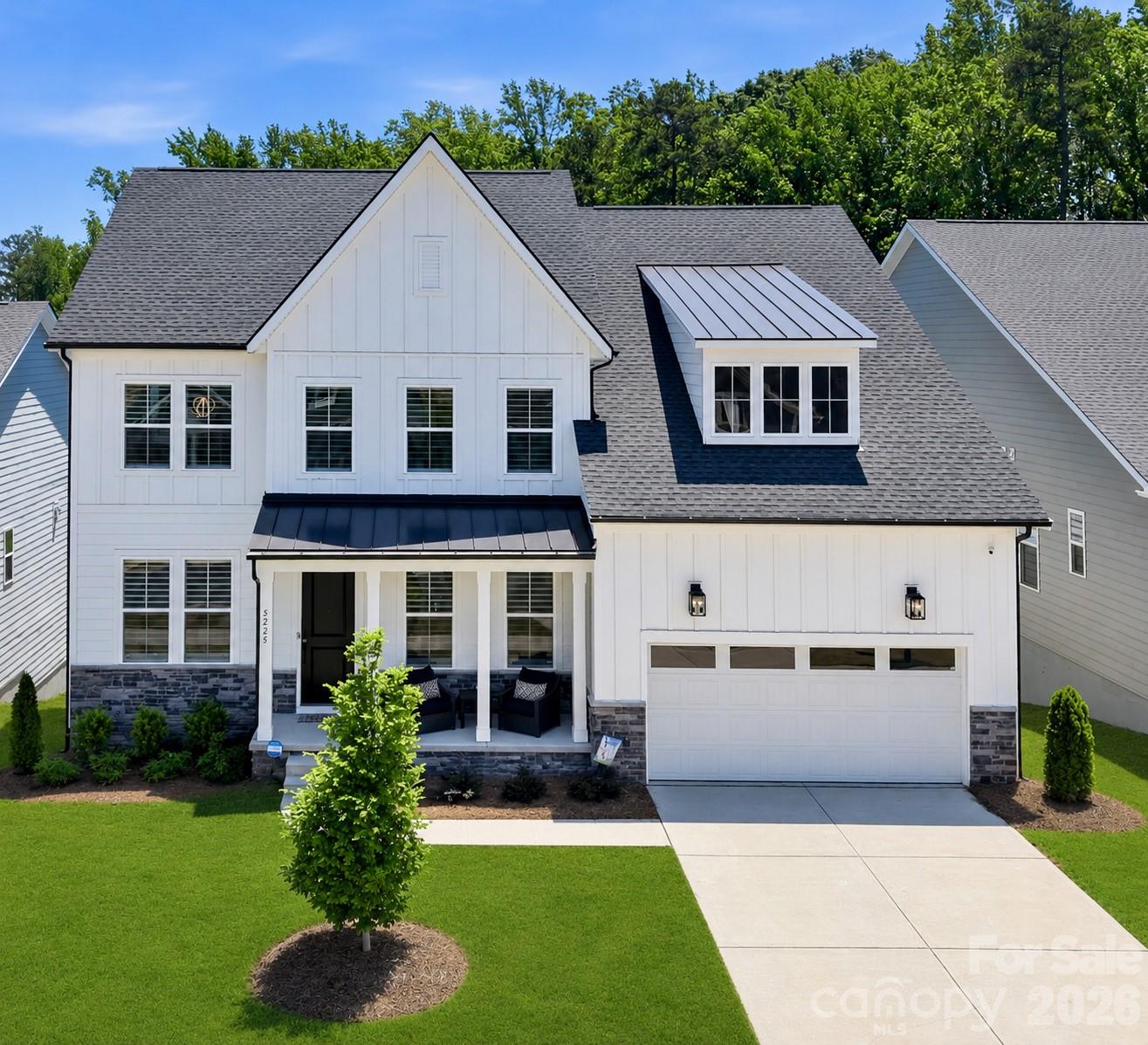 You don't want to miss this amazing home and deal!! Welcome to one of Griffith Lakes’ most extensively customized luxury residences—a remarkable Toll Brothers home offering 6 bedrooms, 5 full baths, and more than 5,100 square feet of impeccably finished living space, including a rare finished basement, all privately situated on a private wooded homesite. Featuring more than $267,000 in premium Toll Brothers design selections and over $250,000 in post-closing custom enhancements, this home delivers a level of craftsmanship, luxury, and completeness that is exceptionally difficult to replicate.

Unlike new construction, every design decision has already been thoughtfully curated and completed. Skip the lengthy build timeline, costly upgrades, and uncertainty—this is a truly turnkey luxury home where virtually every detail has already been elevated beyond the builder’s original vision.

The chef-inspired kitchen showcases premium JennAir appliances, a dramatic quartz waterfall island, custom cabinetry, designer lighting, and seamless flow into expansive living and dining spaces. Walls of windows fill the home with natural light while framing peaceful wooded views that provide exceptional privacy.

The luxurious primary suite offers a spa-inspired retreat, while generously sized secondary bedrooms and flexible living spaces easily accommodate home offices, fitness rooms, guests, or multigenerational living.

The finished basement dramatically expands the home’s versatility with a theater, custom wet bar, spacious recreation areas, private guest suite, full bath, and abundant storage—an exceptionally rare offering within Griffith Lakes.

Residents enjoy resort-style amenities including scenic lakes, miles of walking and nature trails, a resort-style lap pool, six pickleball courts, a tennis court, two fitness centers, inviting fire pits, beautifully designed gathering spaces, and lawn maintenance, all just minutes from Uptown Charlotte, Lake Norman, UNC Charlotte, premier healthcare, shopping, dining, and I-77/I-485.

Now offered at $994,800, this exceptional 6-bedroom, 5-bath residence combines extraordinary scale, timeless luxury, extensive customization, and true move-in-ready convenience into one of Griffith Lakes’ most distinctive opportunities.

Supporting documentation detailing more than $500,000 in builder design selections and post-closing custom enhancements is available upon request.