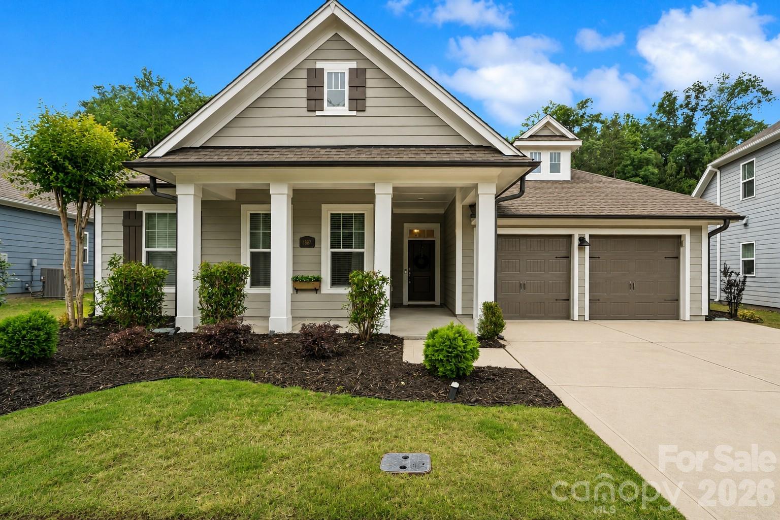 Located in the highly sought-after Massey community and just a few doors down from the neighborhood’s incredible resort-style amenities! This stunning David Weekley Executive Collection home offers 4 bedrooms, 4 full baths,  featuring 10-foot ceilings on the main floor and 9-foot ceilings upstairs.  This beauty includes $50,000 in builder upgrades AND additional current owner improvements.

The open-concept living area features custom built-ins, updated lighting, and large windows overlooking the private tree-lined backyard with added fencing. The kitchen is designed for both everyday living and entertaining with granite countertops, tile backsplash, stainless steel appliances, a large island, plenty of storage!  The updated kitchen faucet complements the upgraded lighting throughout the home!

Privately situated at the rear of the home, the spacious main-level primary suite offers a spa-like ensuite bath with dual vanities, walk-in shower, and soaking tub. A RARE secondary primary suite on the main level includes a custom walk-in closet and beautifully appointed ensuite bath with tiled walk-in shower and oversized vanity.  Don't miss the third spare bedroom on main floor with shared full bathroom. Upstairs, an expansive loft with custom built-ins spanning two walls creates the perfect flex space, along with an additional bedroom and full bath.

Enjoy relaxing year-round on the oversized covered back porch with double ceiling fans and a gas line added for easy outdoor grilling or entertaining.

Massey is known for its exceptional community atmosphere and unmatched amenities including a resort-style pool with lazy river, waterslide, and splash area. The impressive community clubhouse offers a fitness gym, movie theater, event space with kitchen, and elevator access. Residents also enjoy multiple playgrounds, pocket parks, open green spaces, a community fire pit and  paved trails! Memories are created with planned movie nights, holiday events, and golf cart parades throughout the year!  All of this is located within the award-winning Fort Mill School District!